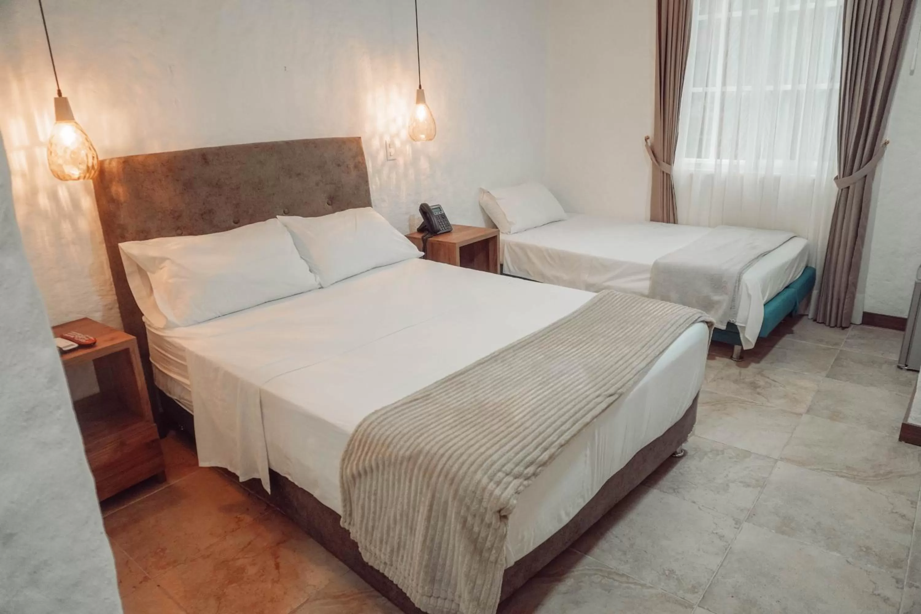 Superior Triple Room in Casa del Hidalgo Hotel Cali Centenario