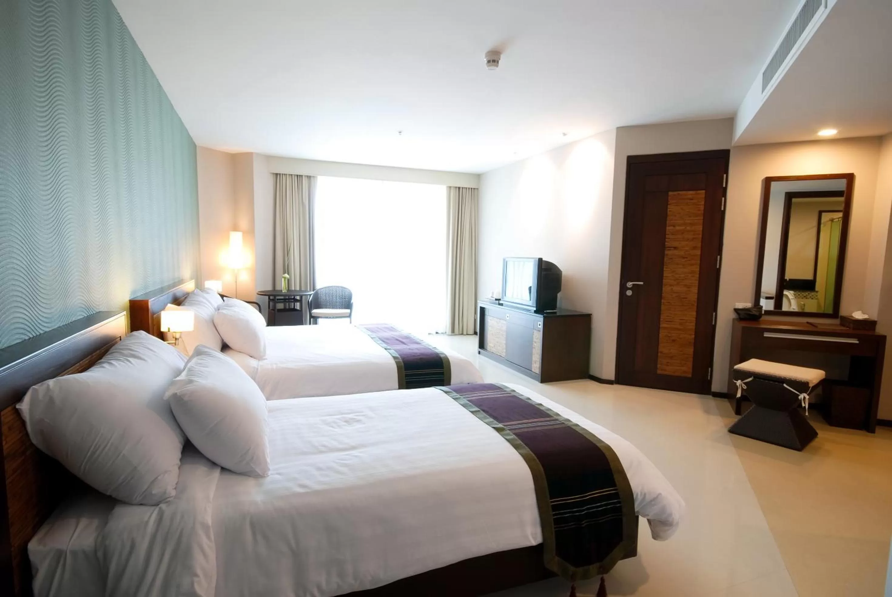 Bed in Tara Mantra Cha-Am Resort