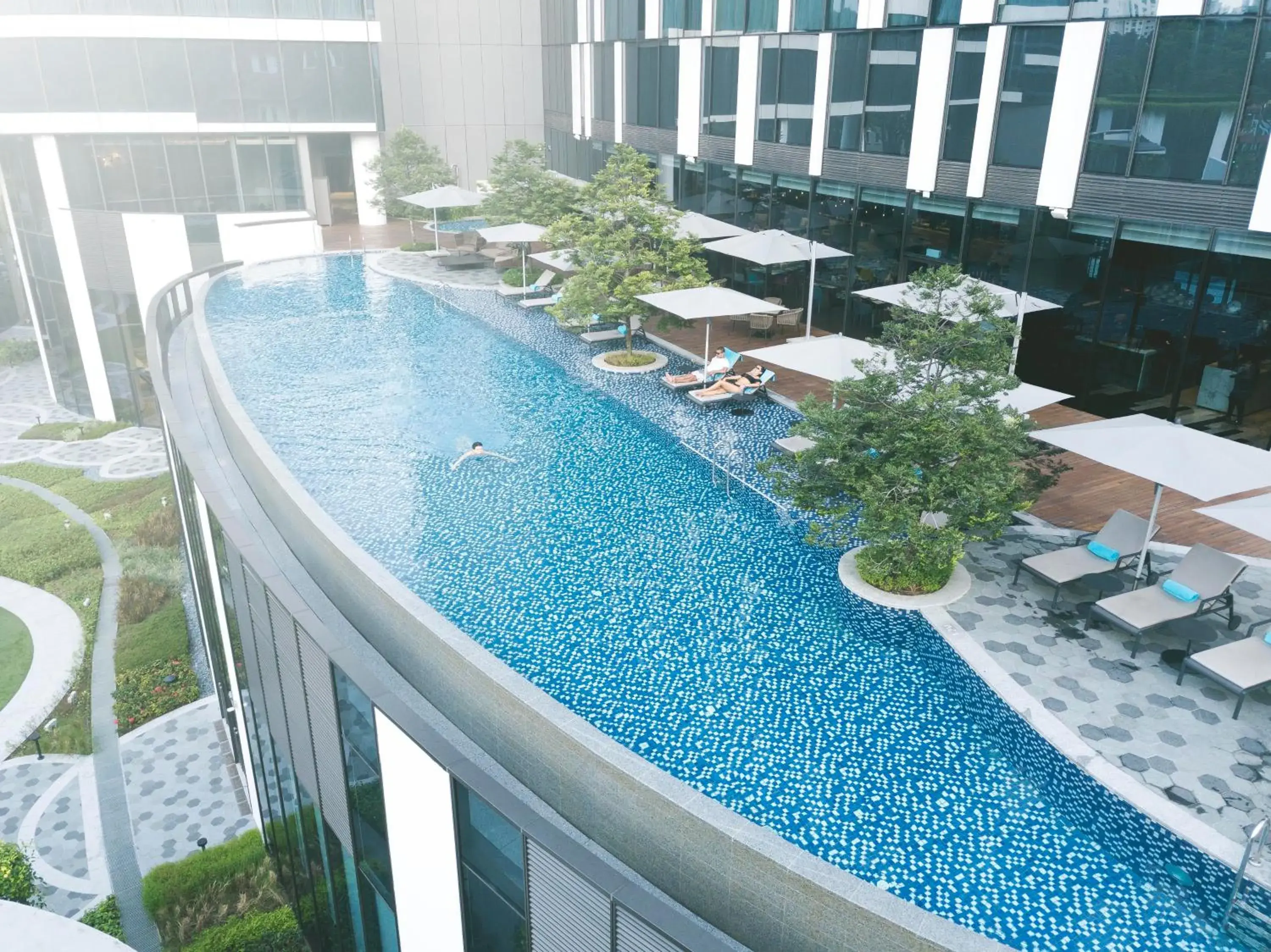 Patio, Pool View in Novotel Singapore On Stevens