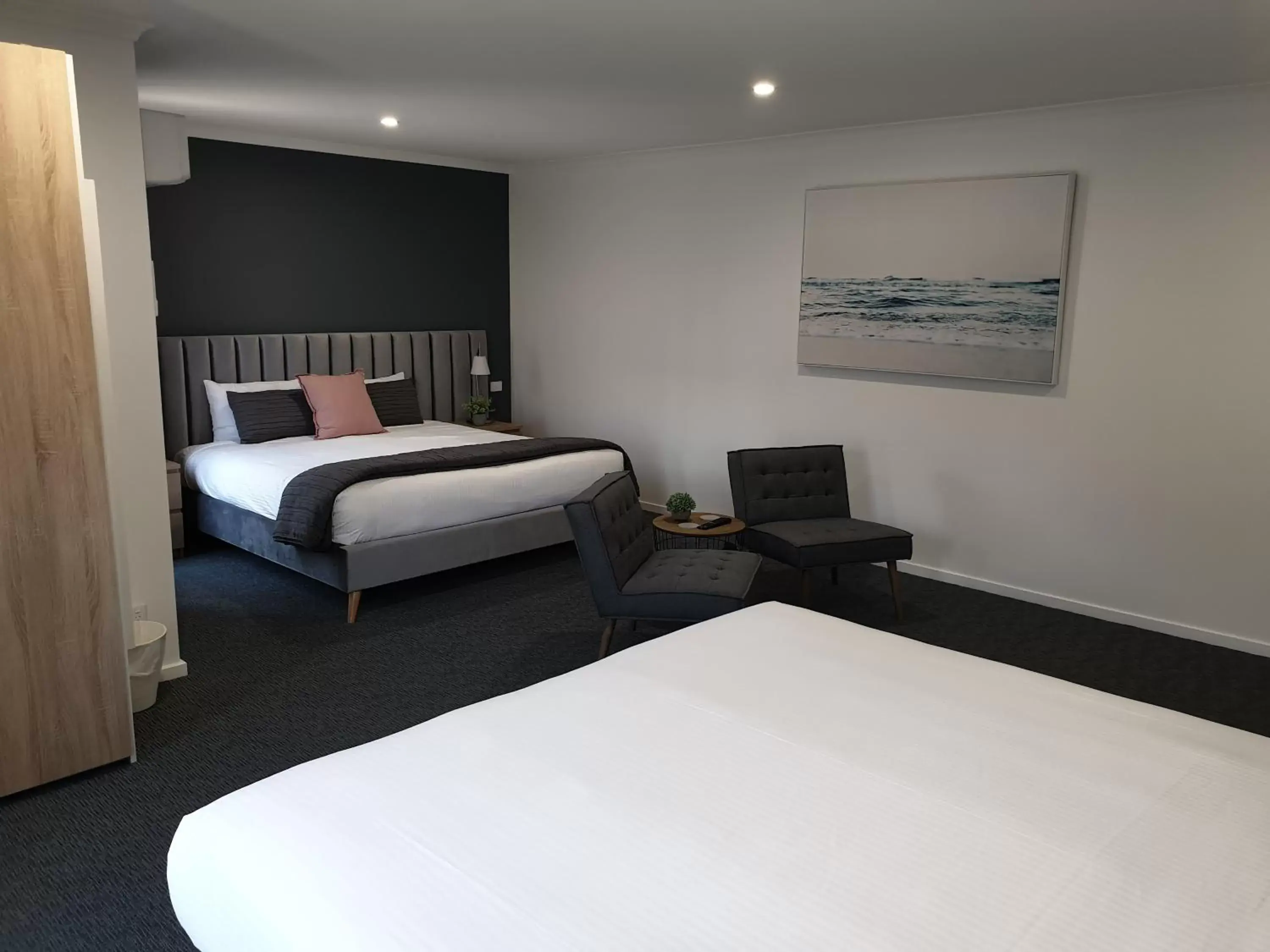 Bed in Twofold Bay Motor Inn