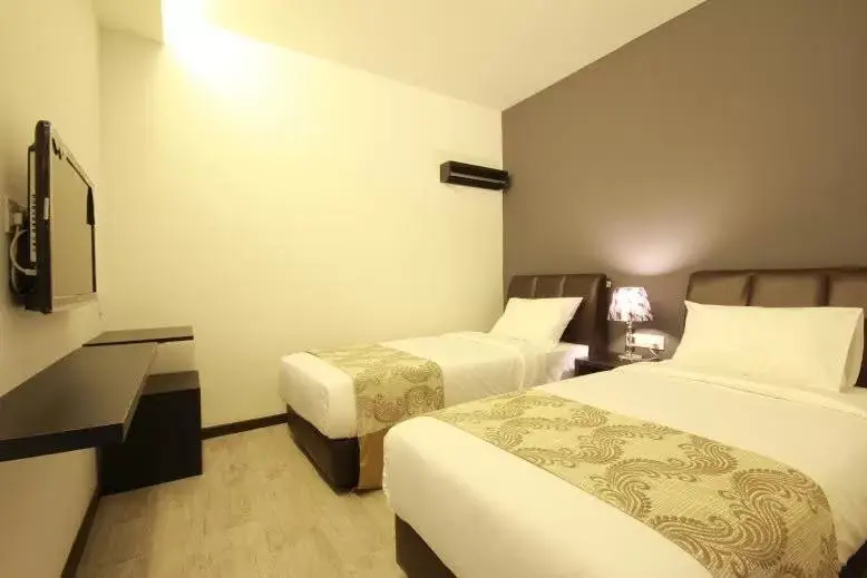 Bed in Sandy Hotel Malacca