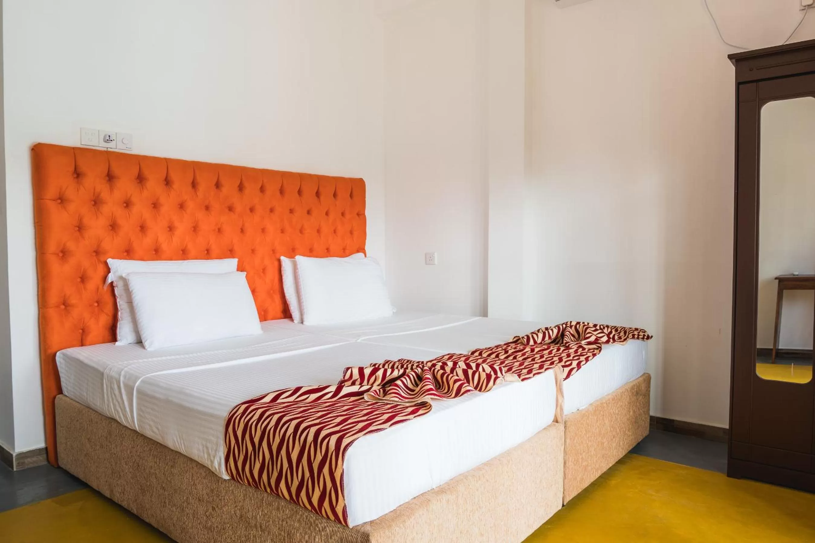 Bed in Ocean Bay Surf Resort Weligama