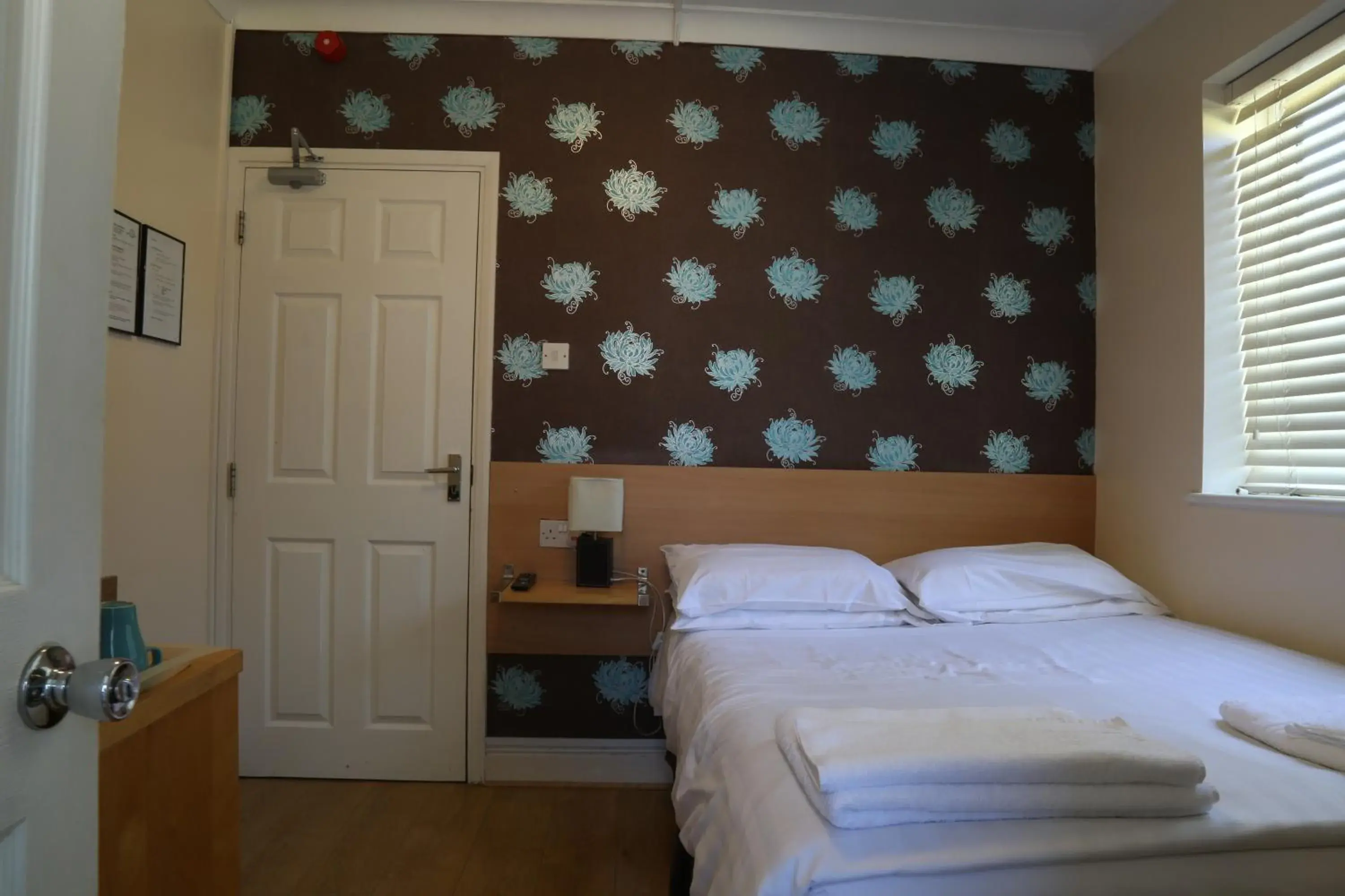 Bed in Debden Guest House