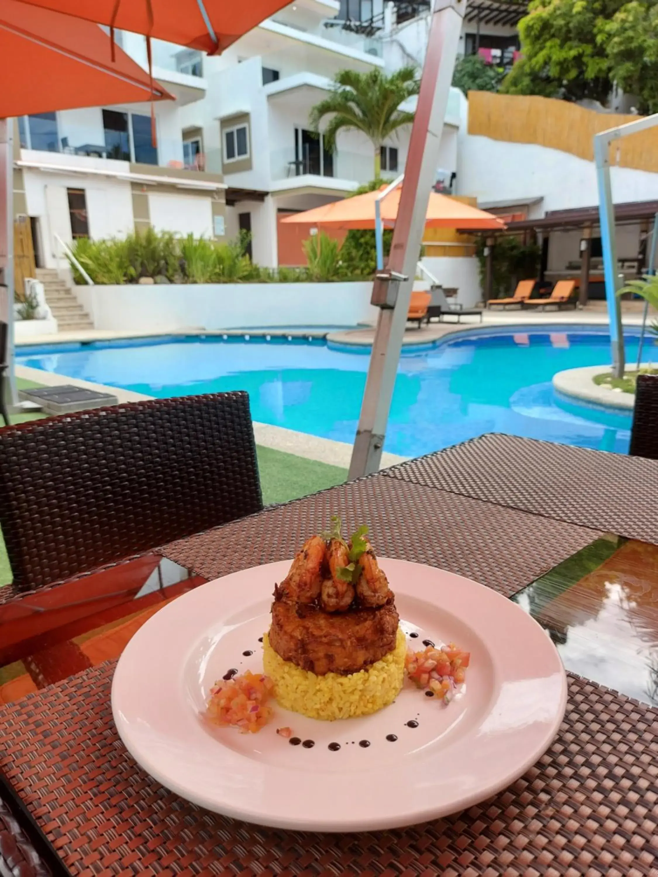 Food, Swimming Pool in Lalaguna Villas Luxury Dive Resort and Spa