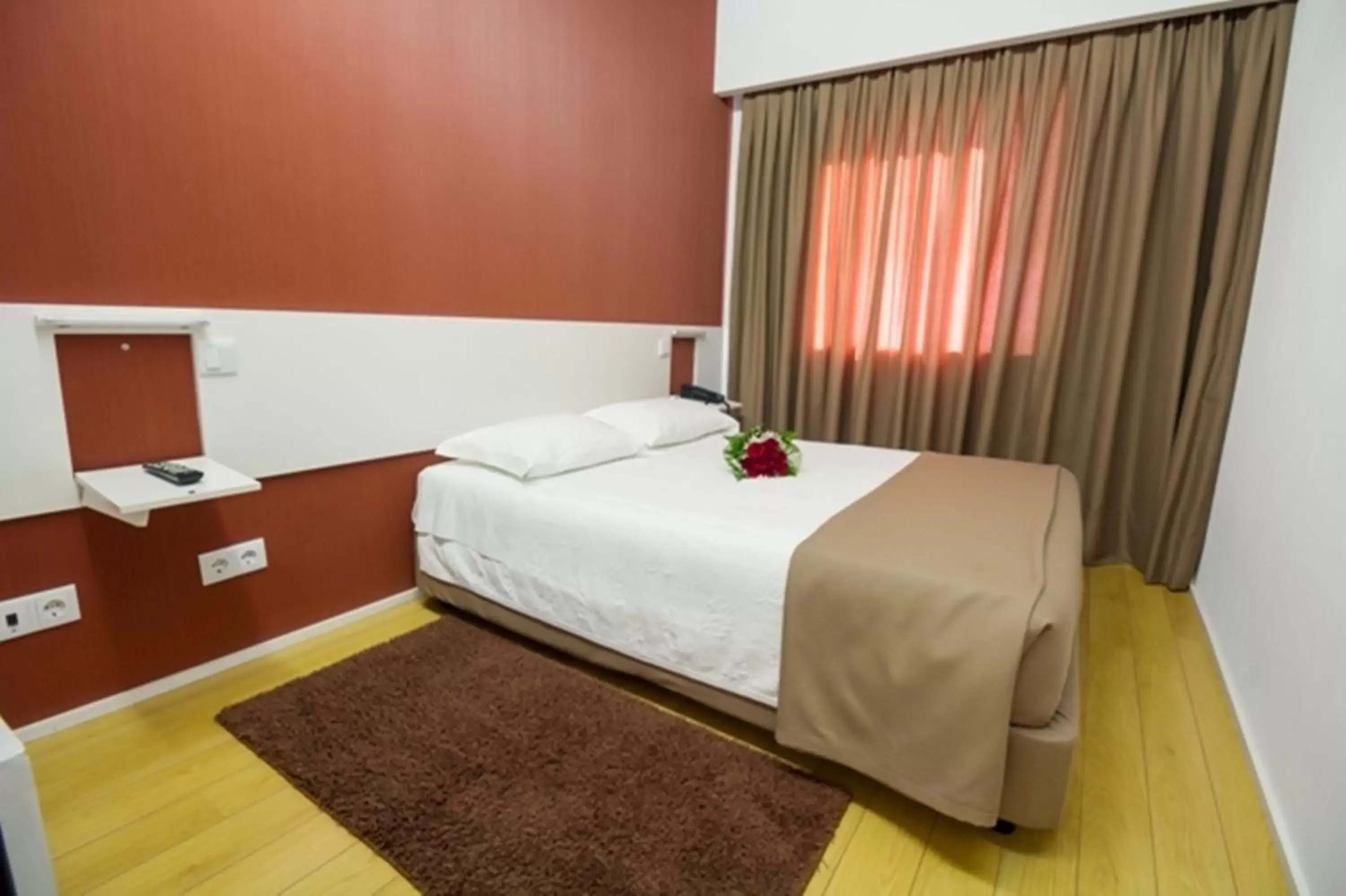 Bed in Hotel Laranjeira