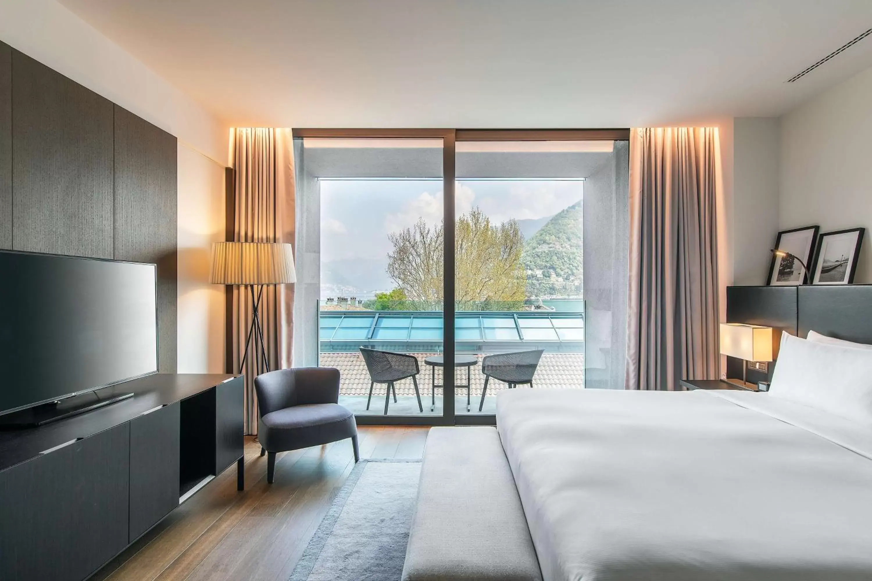 Bed, Pool View in Hilton Lake Como