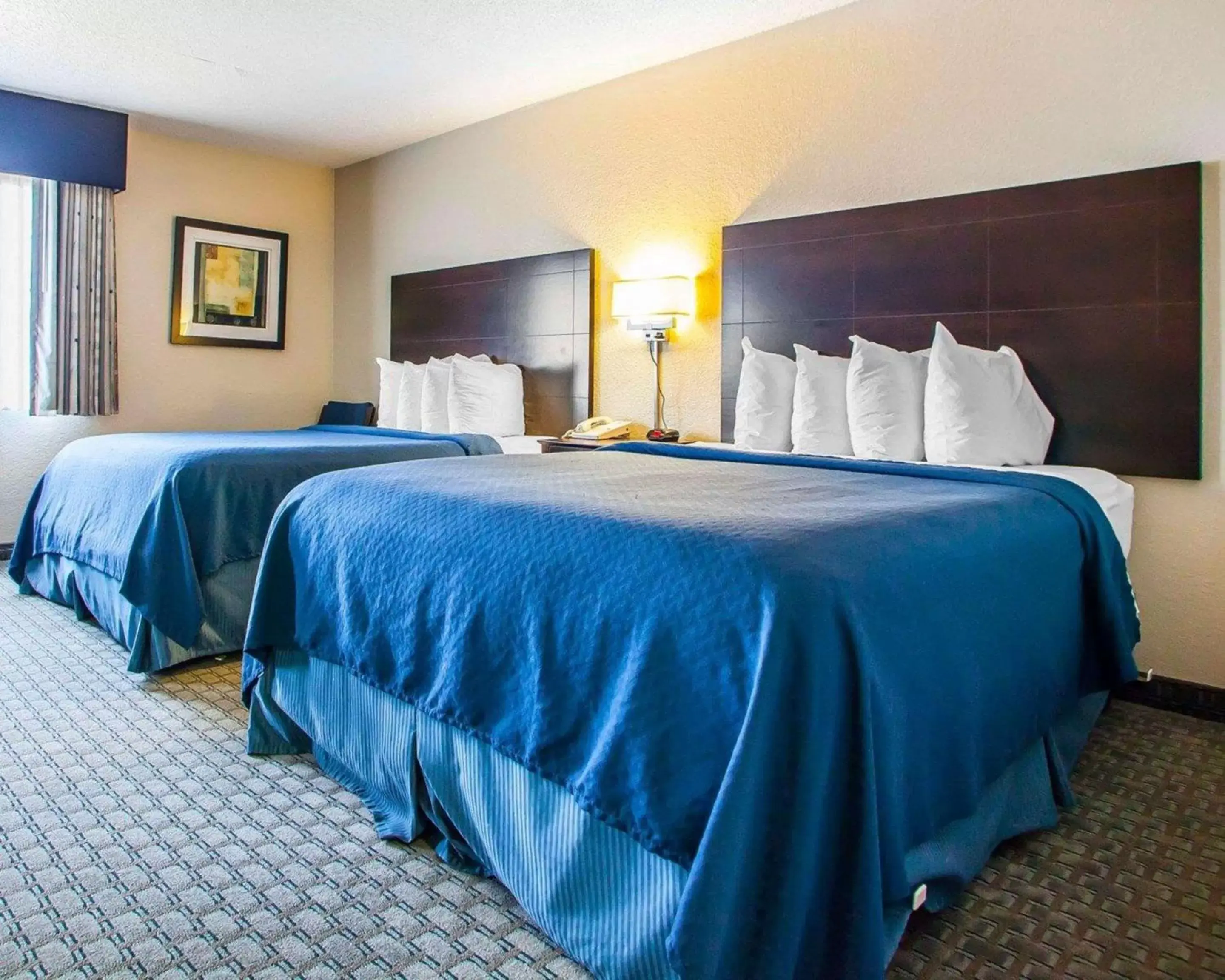 Photo of the whole room, Bed in Quality Inn & Suites Ankeny-Des Moines