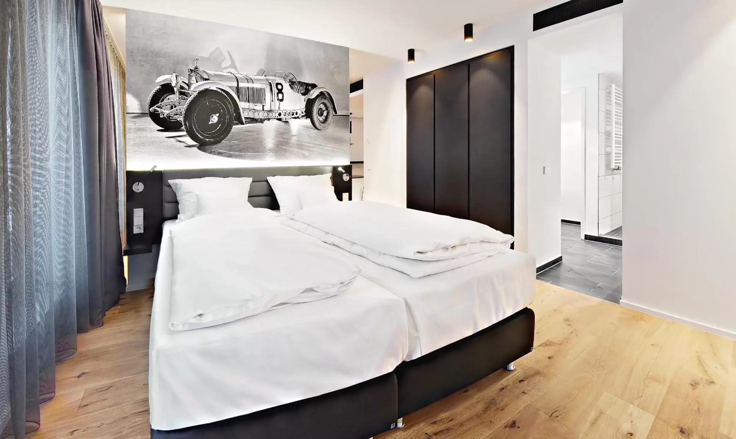 Photo of the whole room, Bed in V8 HOTEL Motorworld Region Stuttgart