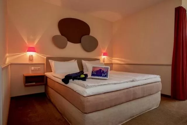 Photo of the whole room, Bed in Landhotel Broda