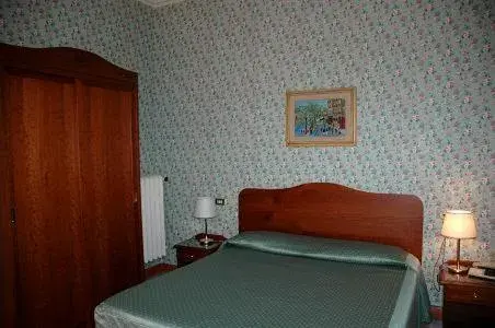 Bed in Hotel Beatrice