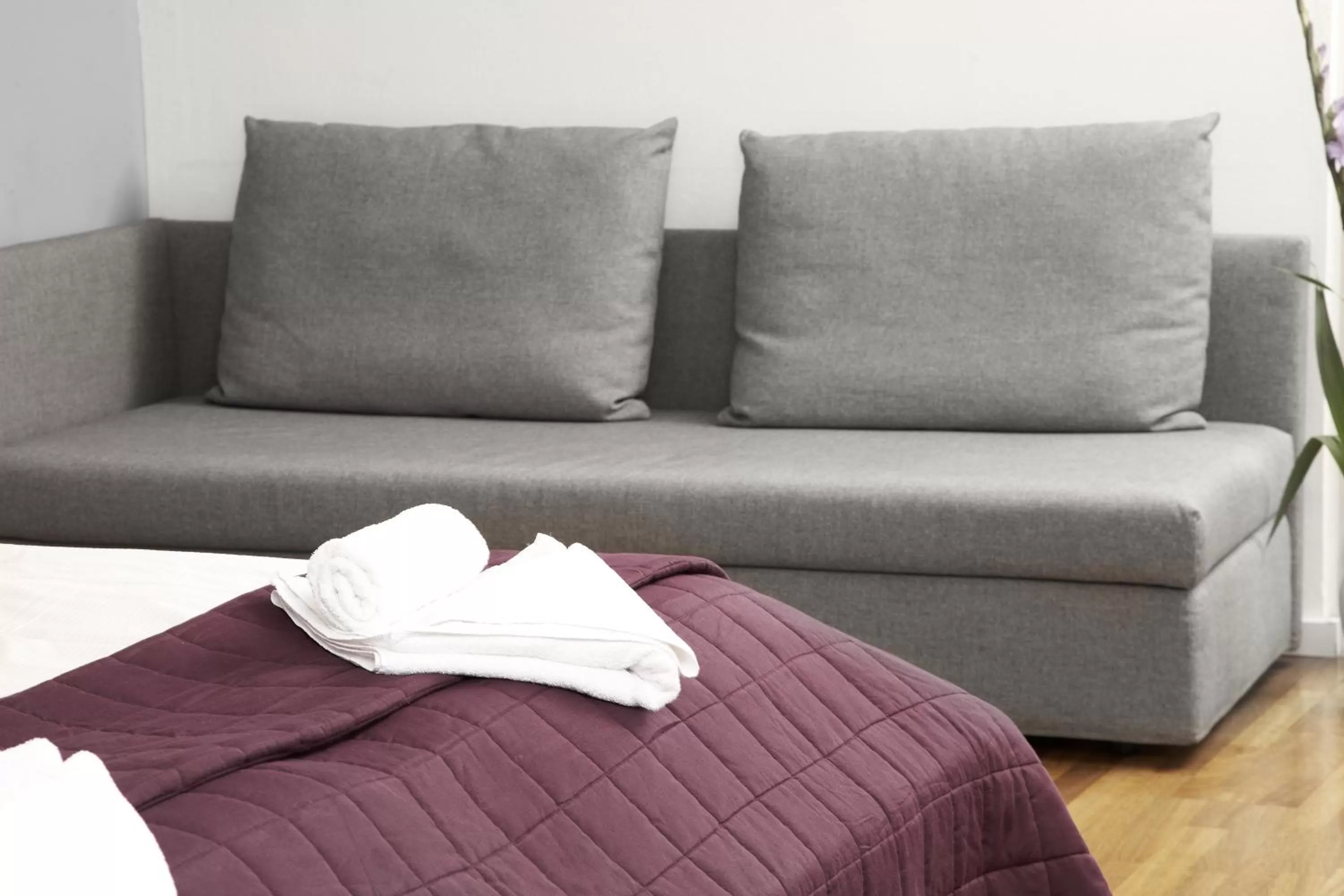 Seating area, Bed in Karlito Apartmenthaus