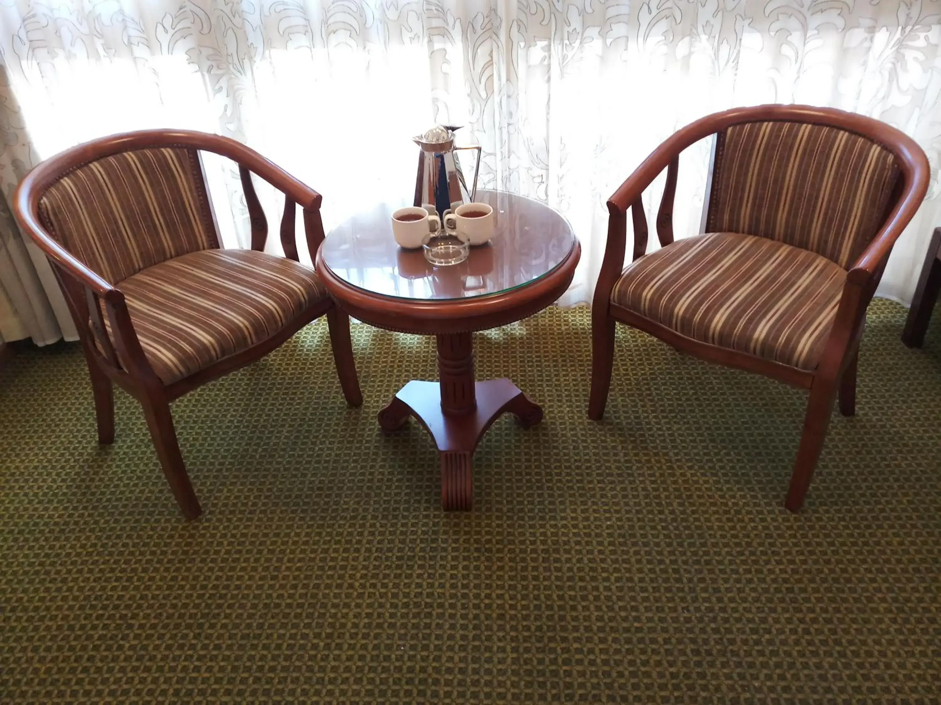 Seating Area in Oriental Palace Hotel