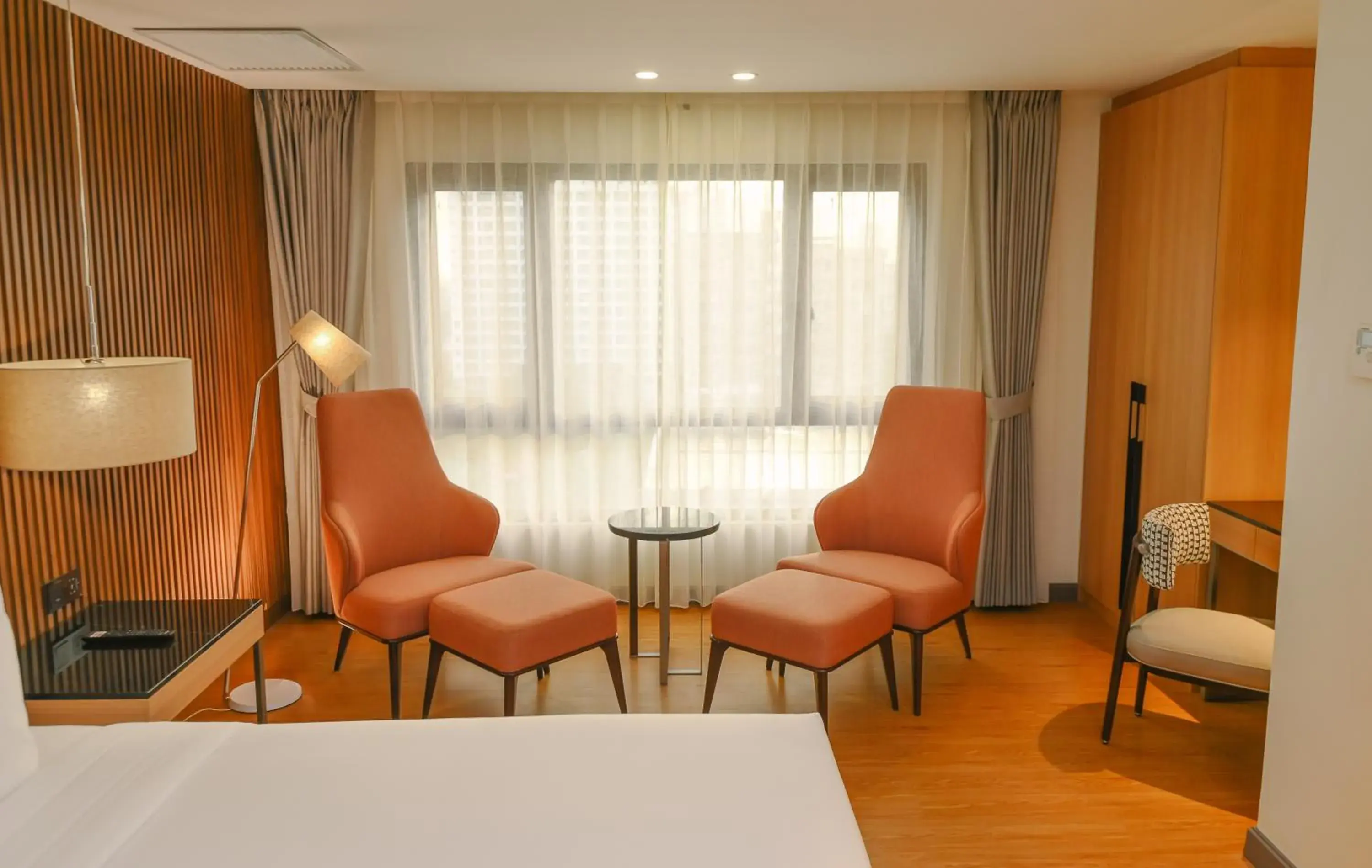 Bedroom, Seating Area in Ardenhills Suites