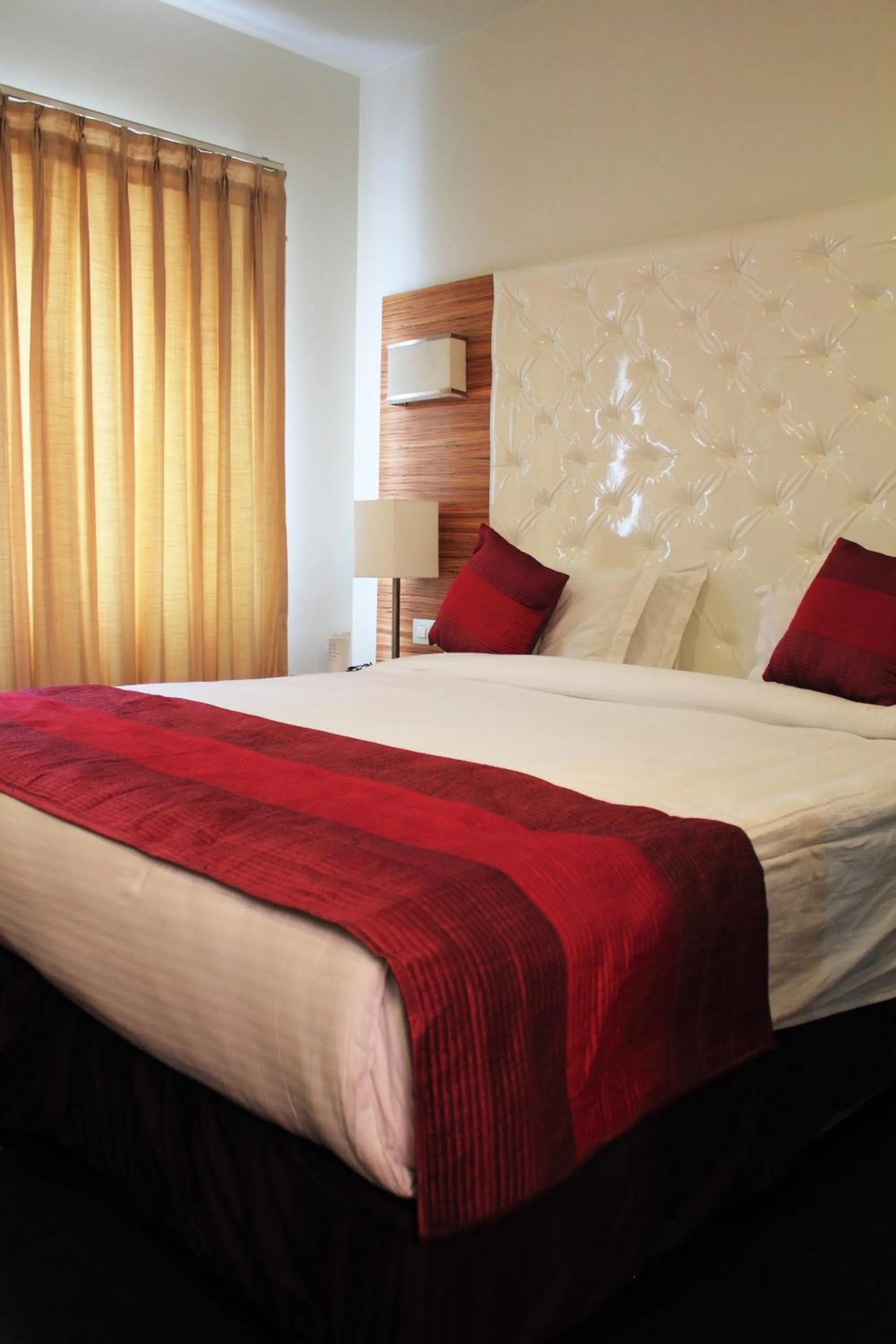 Bed in Hotel Ivory 32