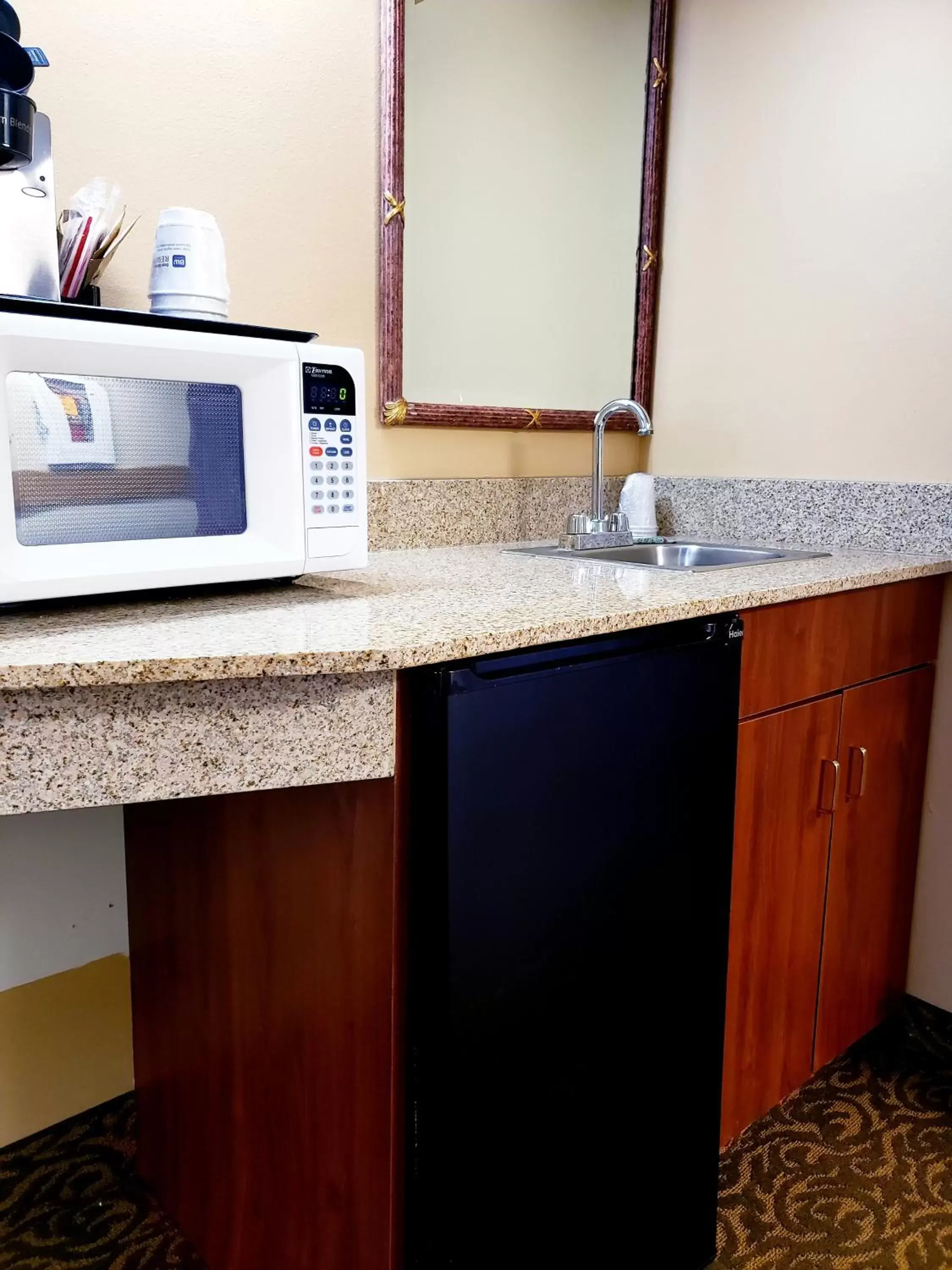 Kitchen/Kitchenette in SureStay Plus Hotel by Best Western Black River Falls