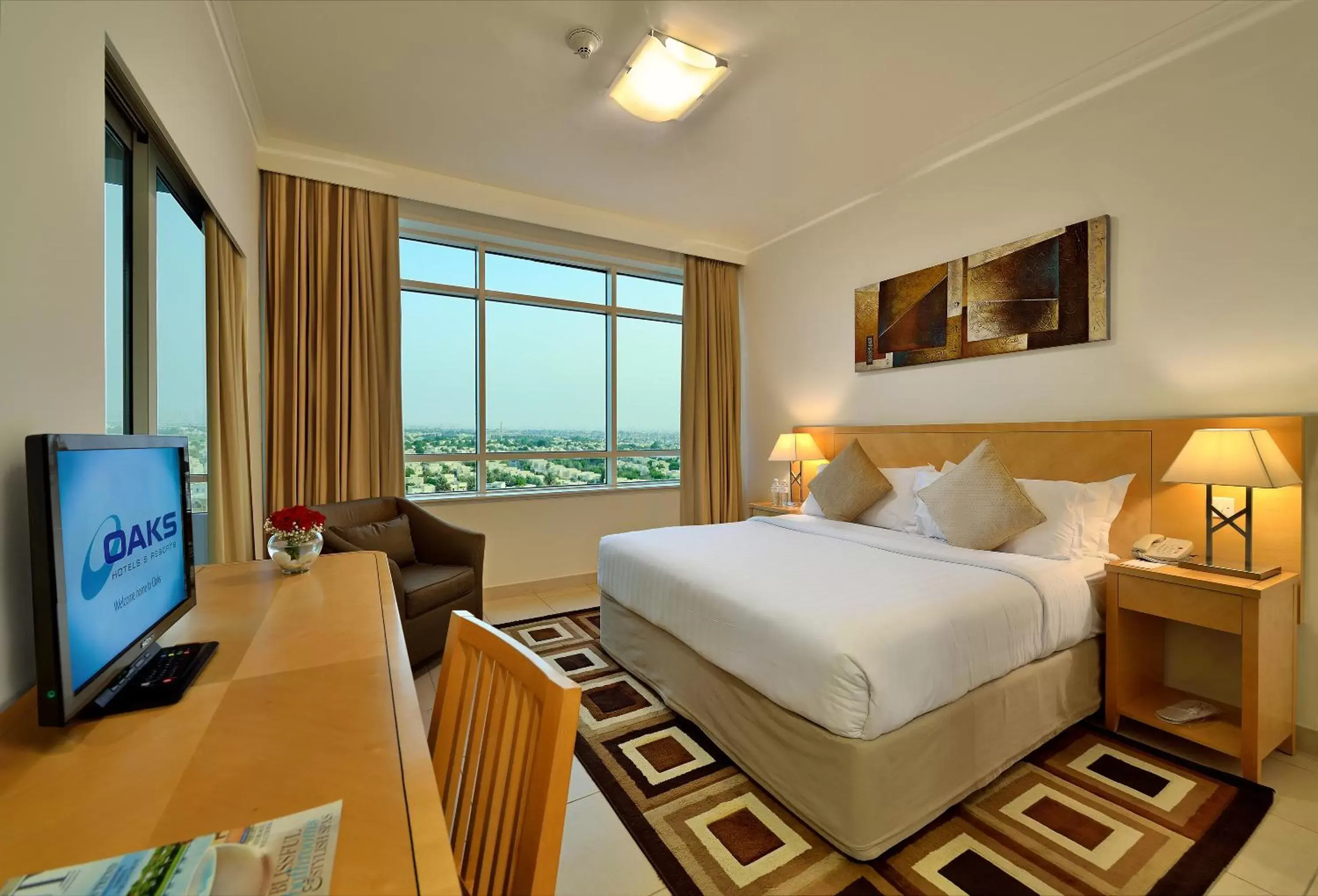 Bedroom in Oaks Liwa Heights Hotel Suites