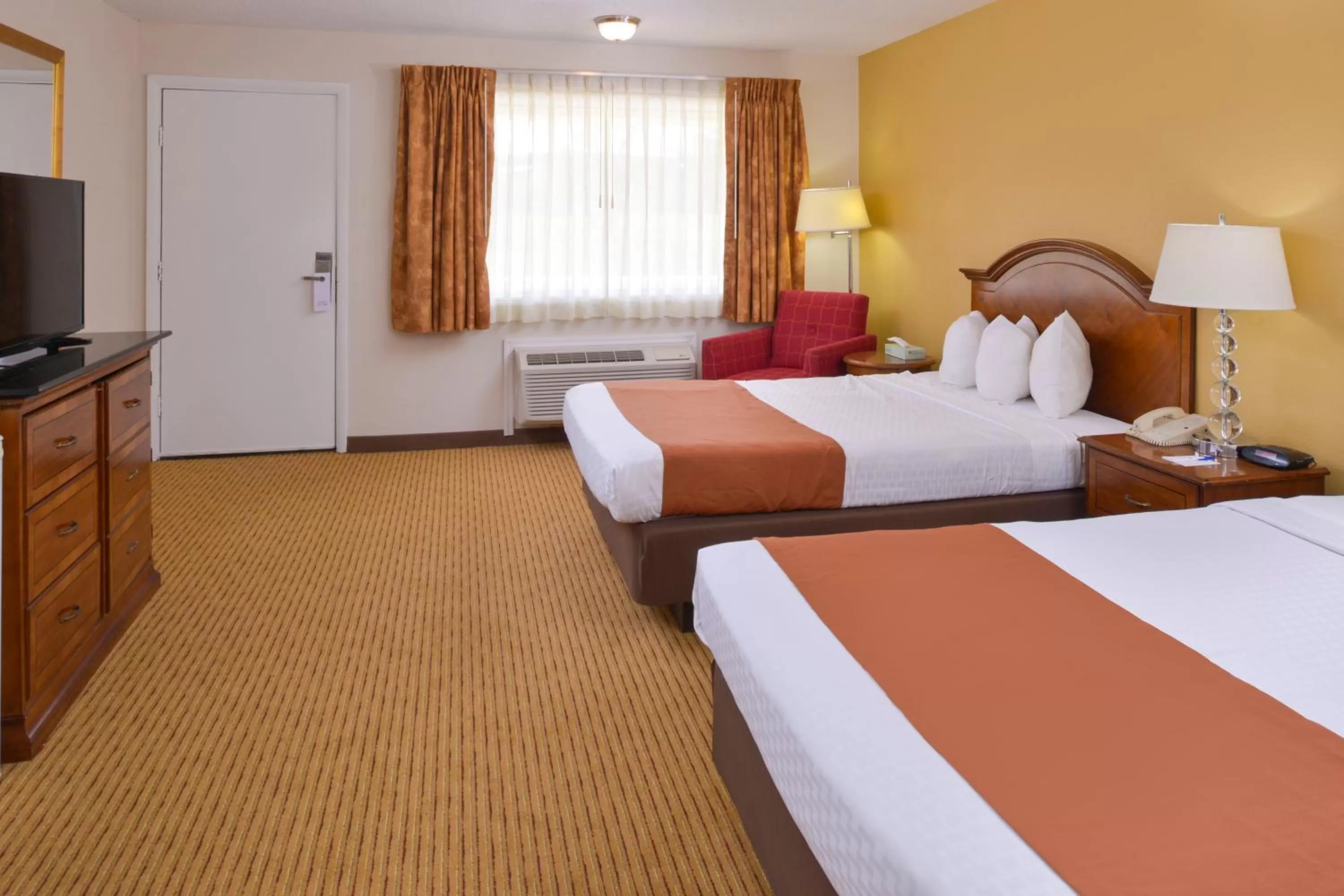 Bed in Americas Best Value Inn Plattsburgh