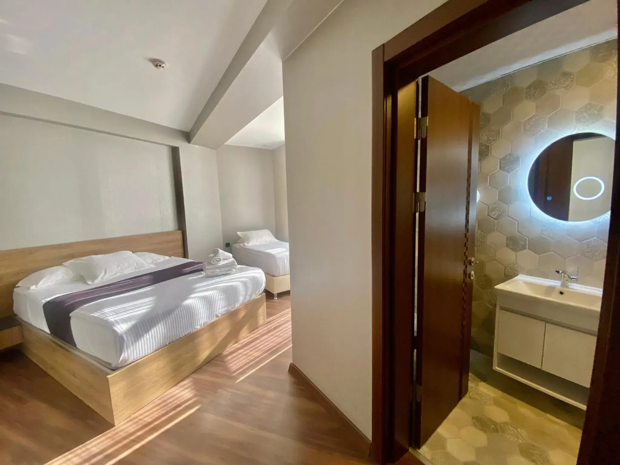 Bed, Bathroom in Hotel Concept Royal