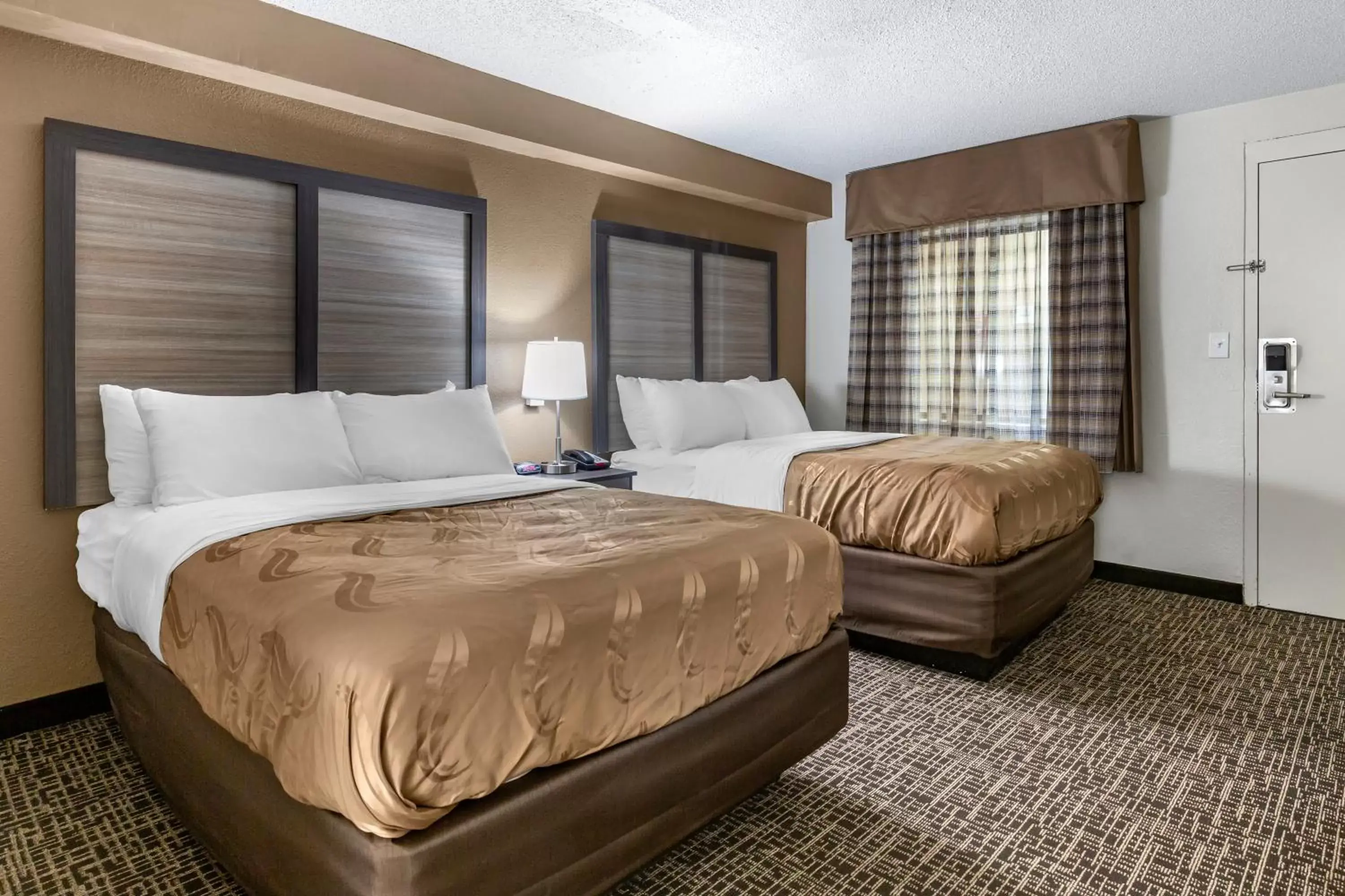 Bedroom, Bed in Quality Inn & Suites Spring Lake - Fayetteville Near Fort Liberty