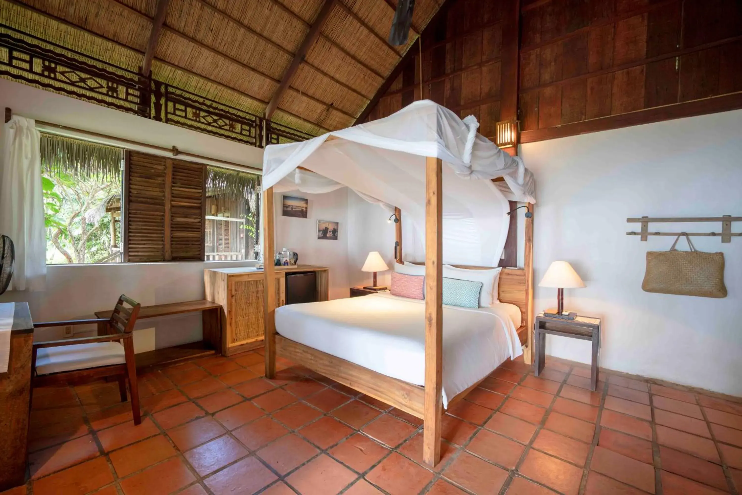 Bed in Mango Bay Resort