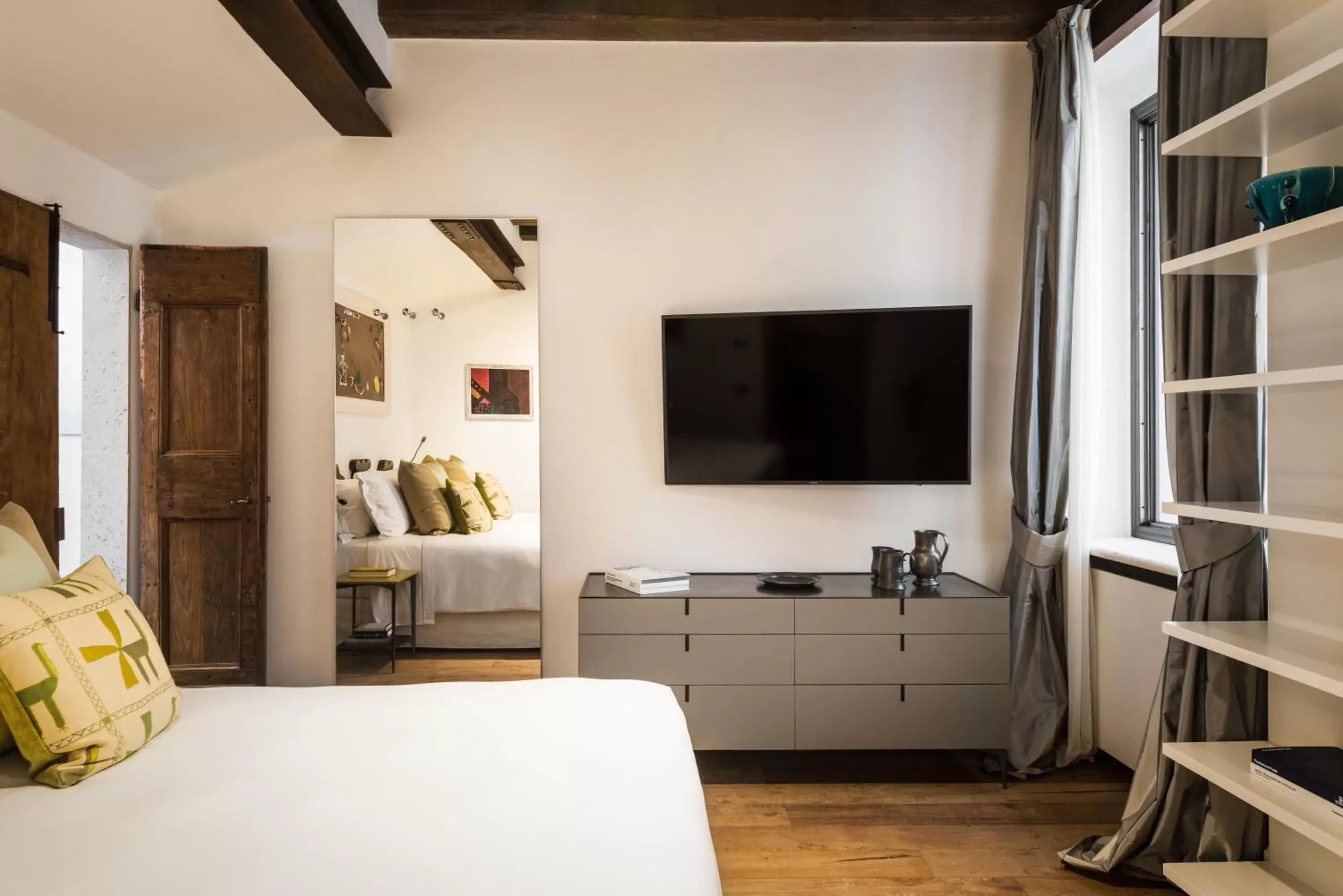 Bedroom, TV/Entertainment Center in Palazzo Delle Pietre - Luxury Apartments