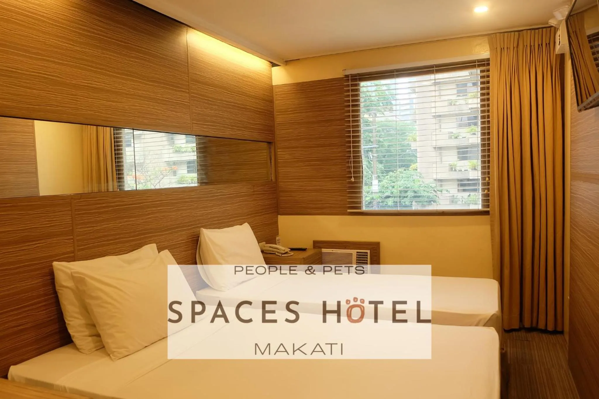 Bed in Spaces Hotel Makati