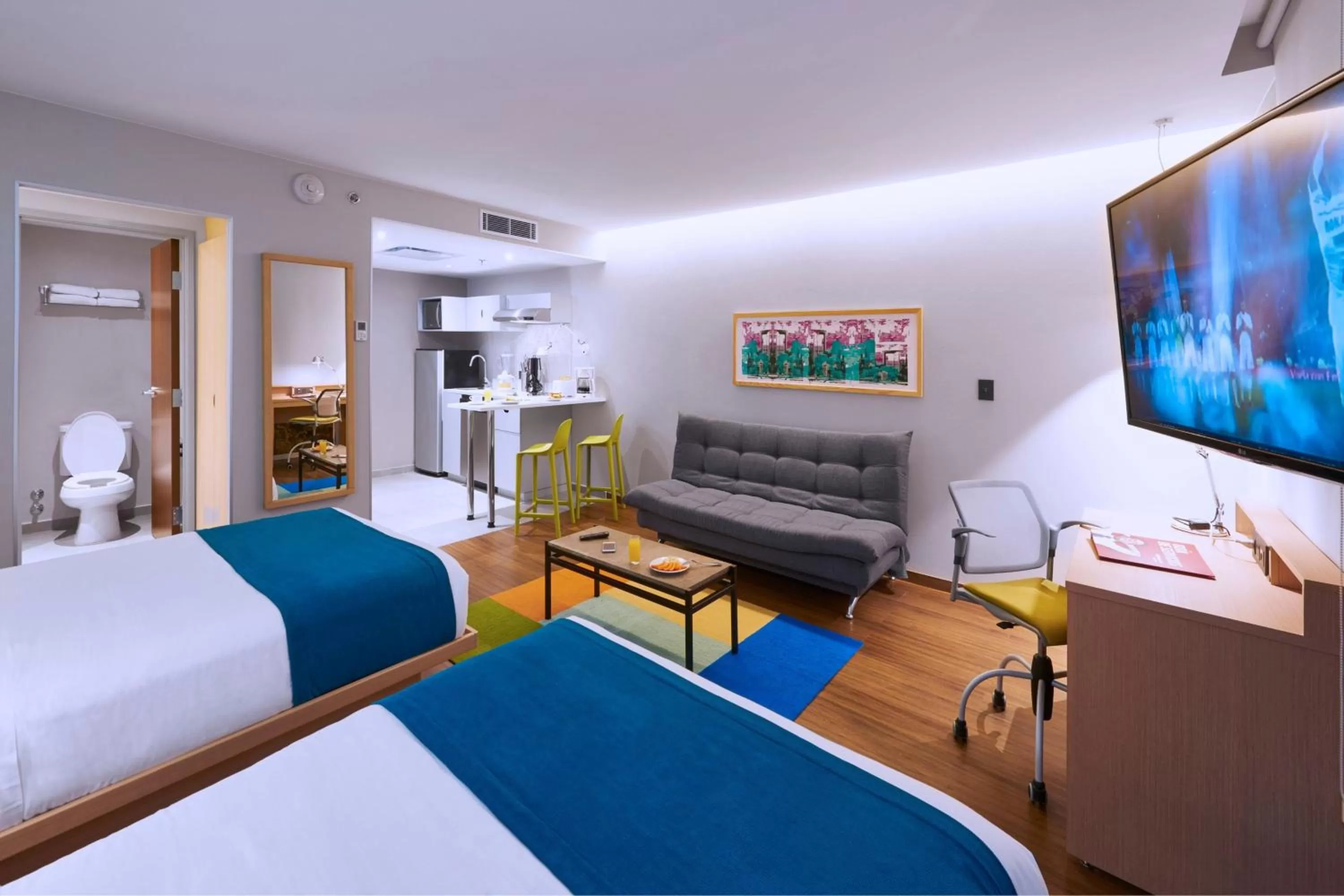 Photo of the whole room in City Express Suites by Marriott Playa del Carmen