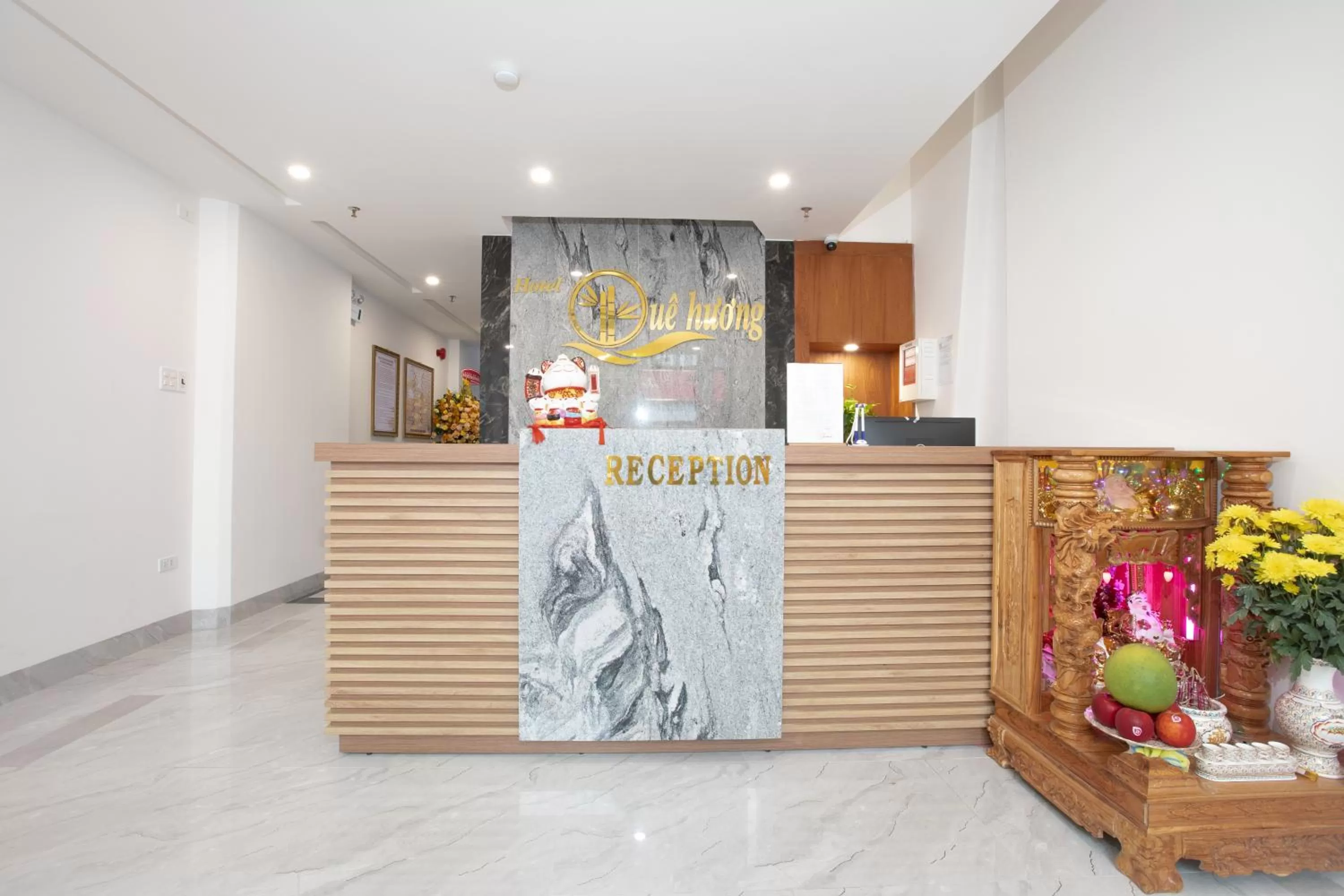 Property logo or sign in QUE HUONG HOTEL