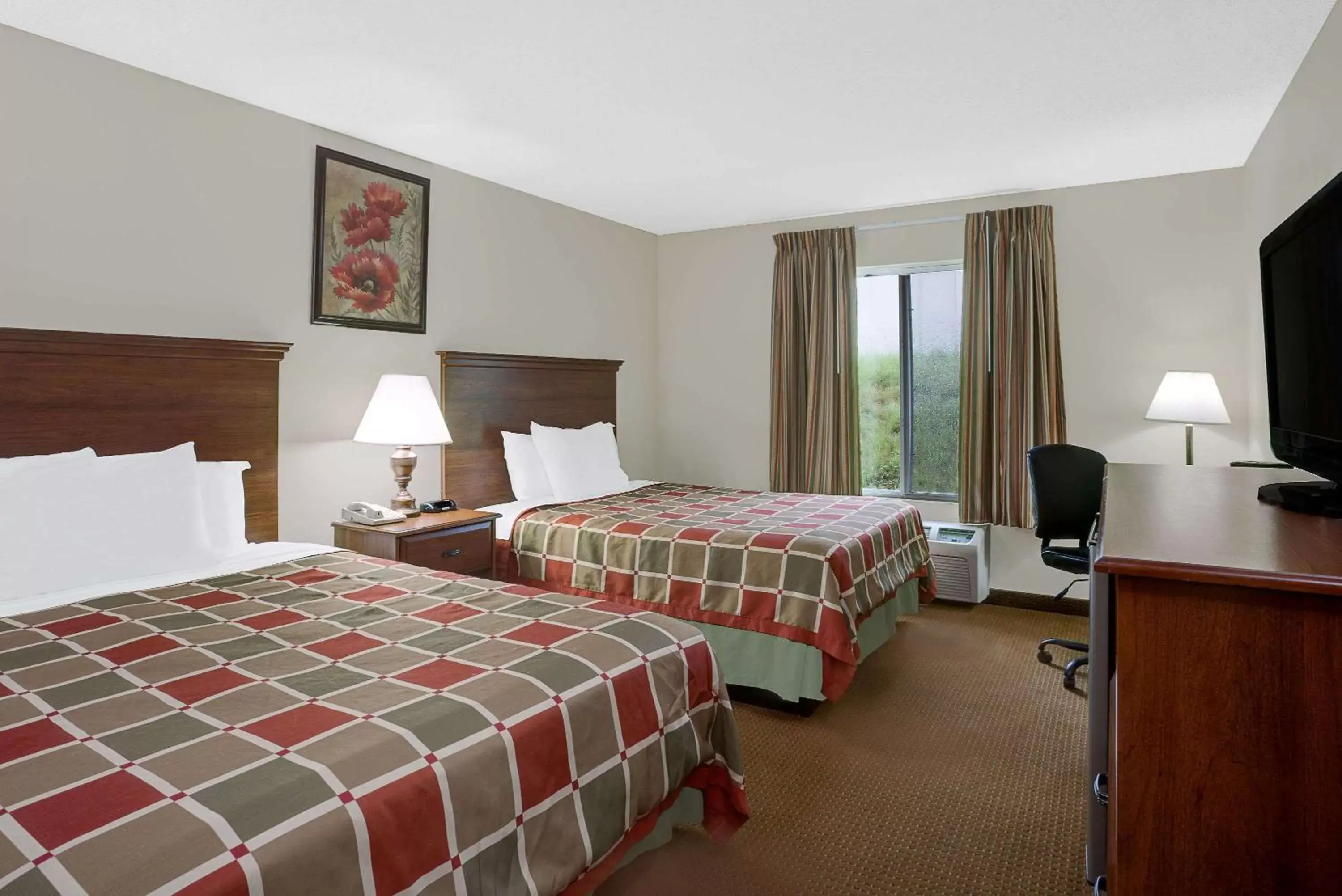 Photo of the whole room, Bed in Days Inn by Wyndham Greensboro NC