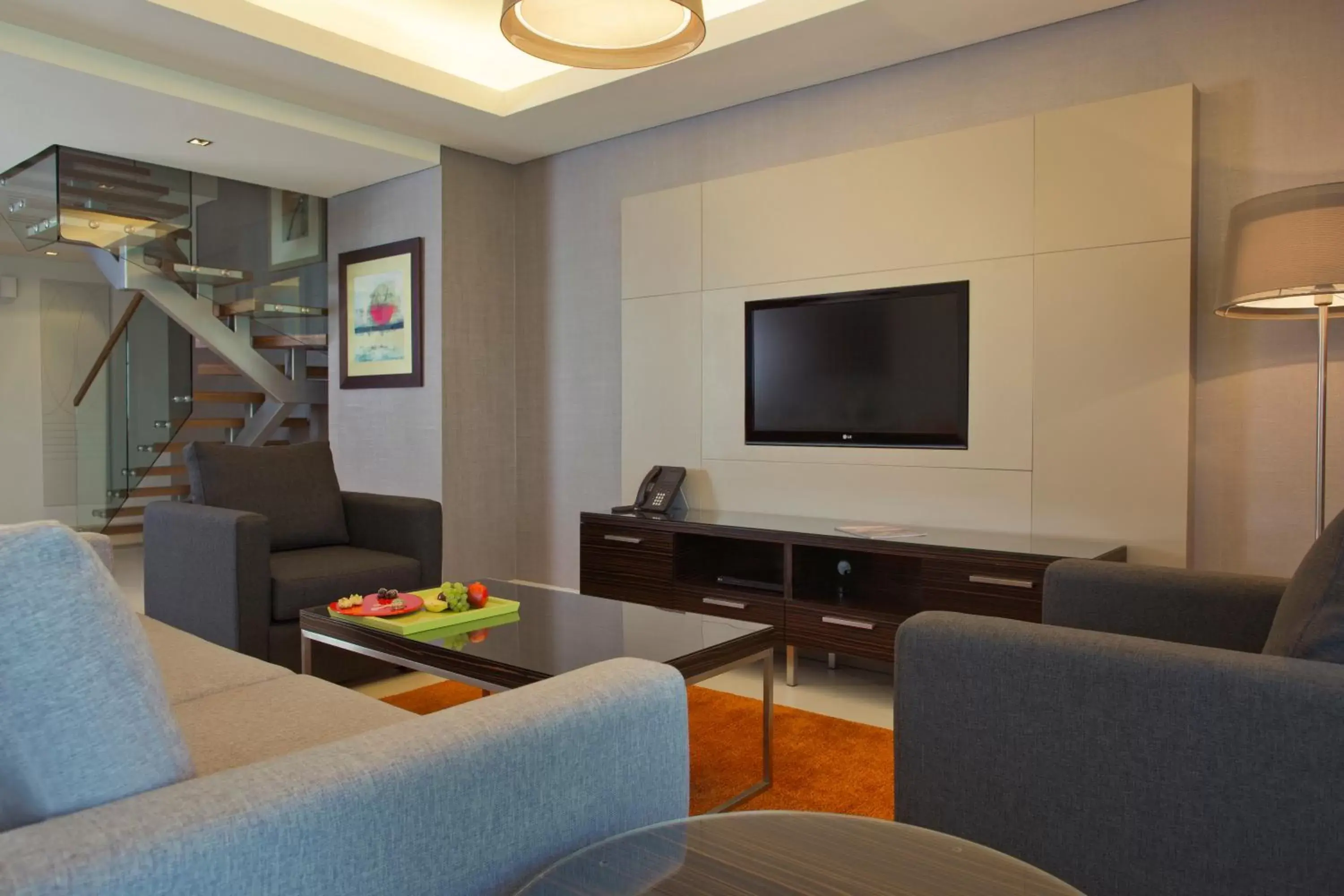 TV and multimedia, Seating Area in Majestic Arjaan by Rotana – Manama