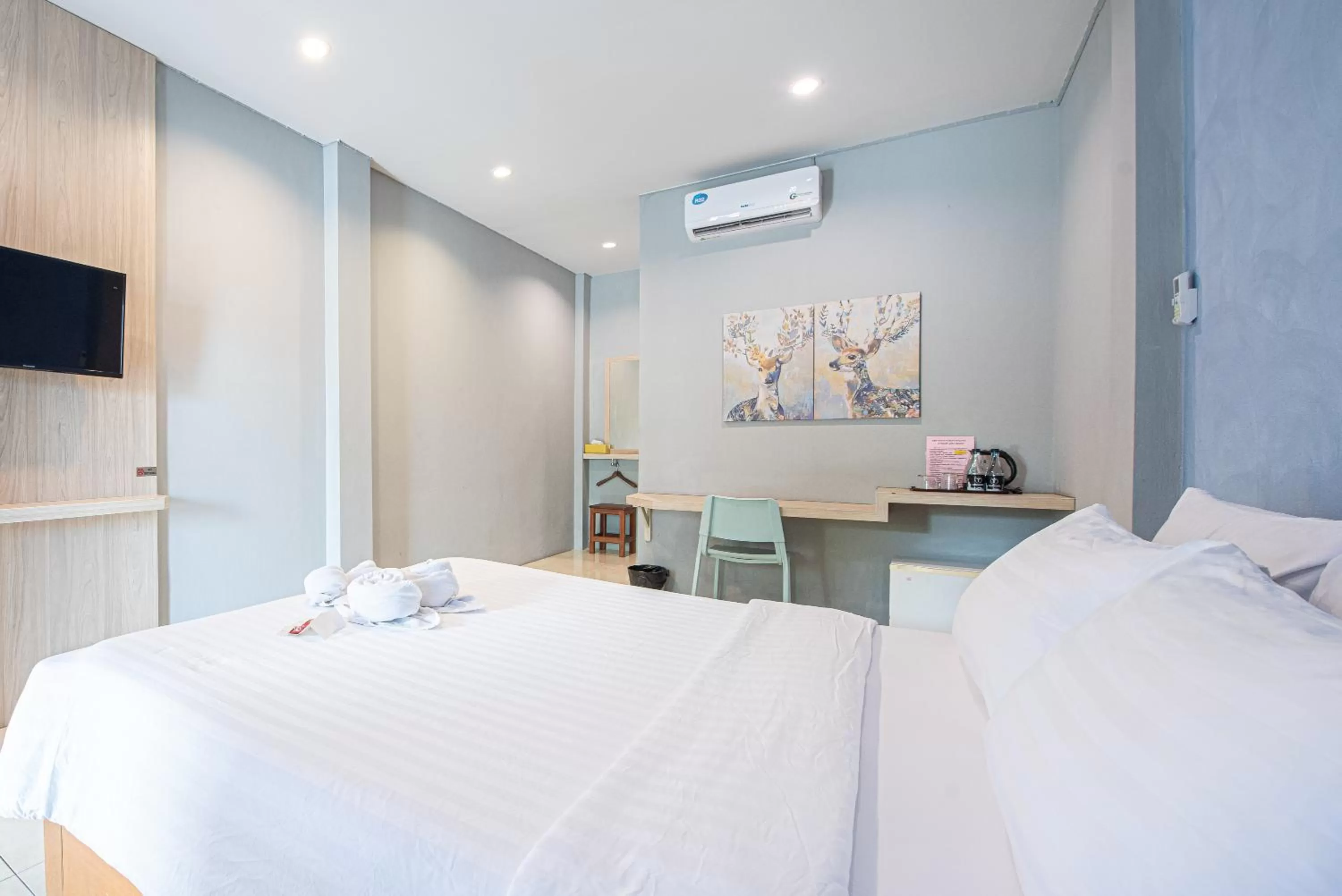 Bed in Tarnsiri Boutique Resort