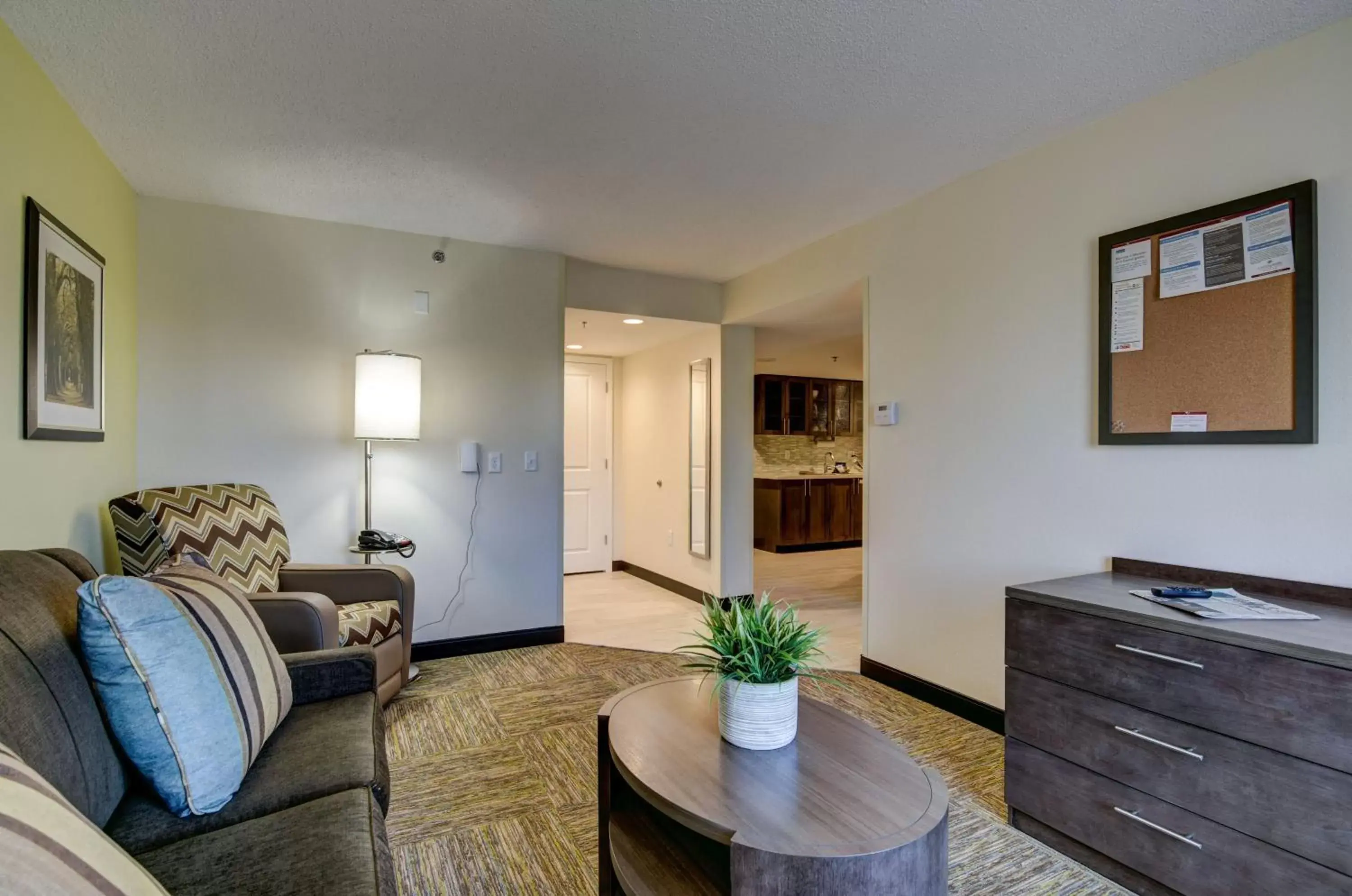 Bedroom, Seating Area in Candlewood Suites Richmond - West Broad, an IHG Hotel