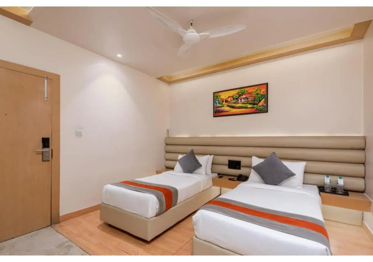 Bedroom, Bed in Hotel Arihant By DLS Hotels