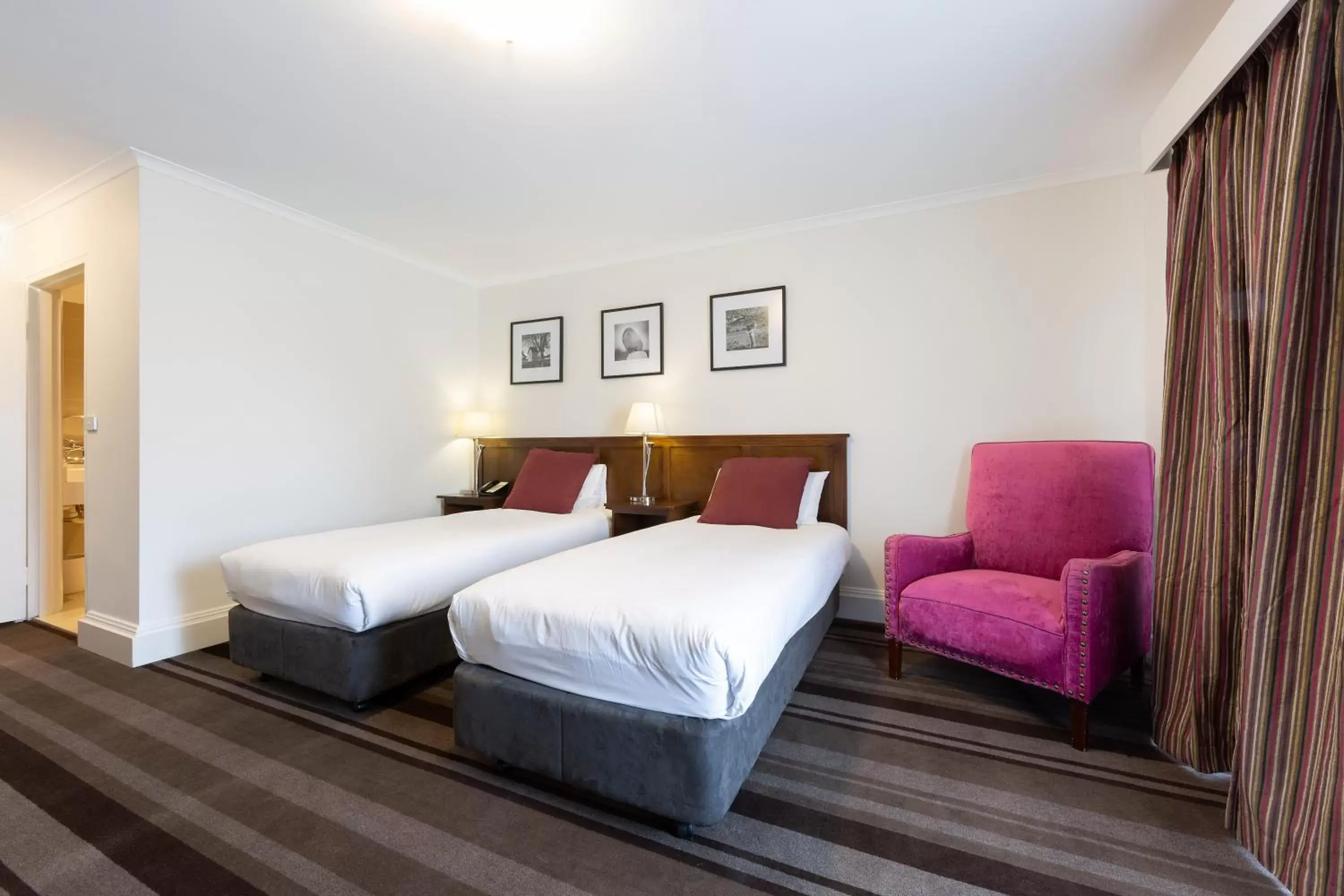 Bed in Mercure Canberra