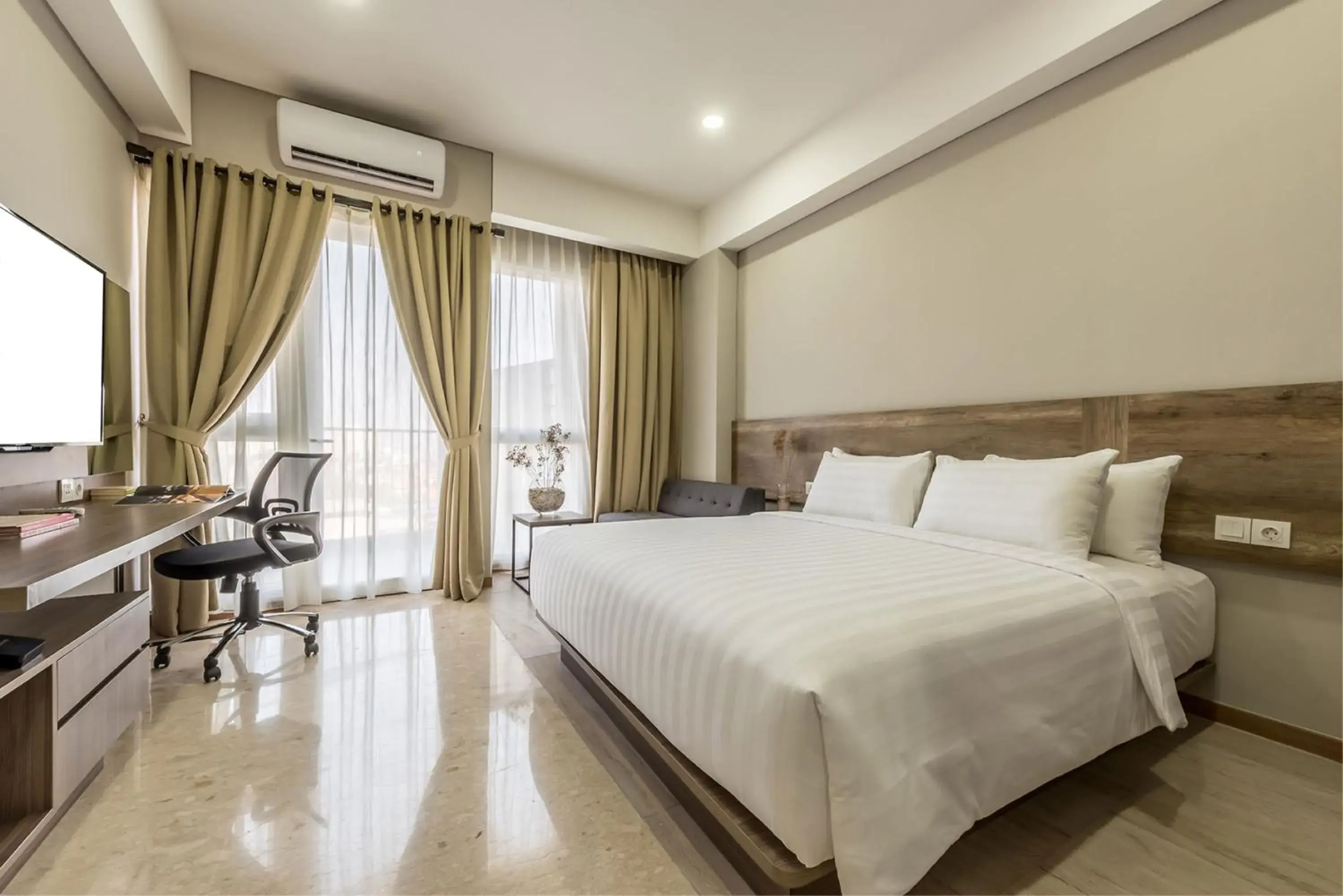 Bed in Grande Valore Hotel & Serviced-Apartment