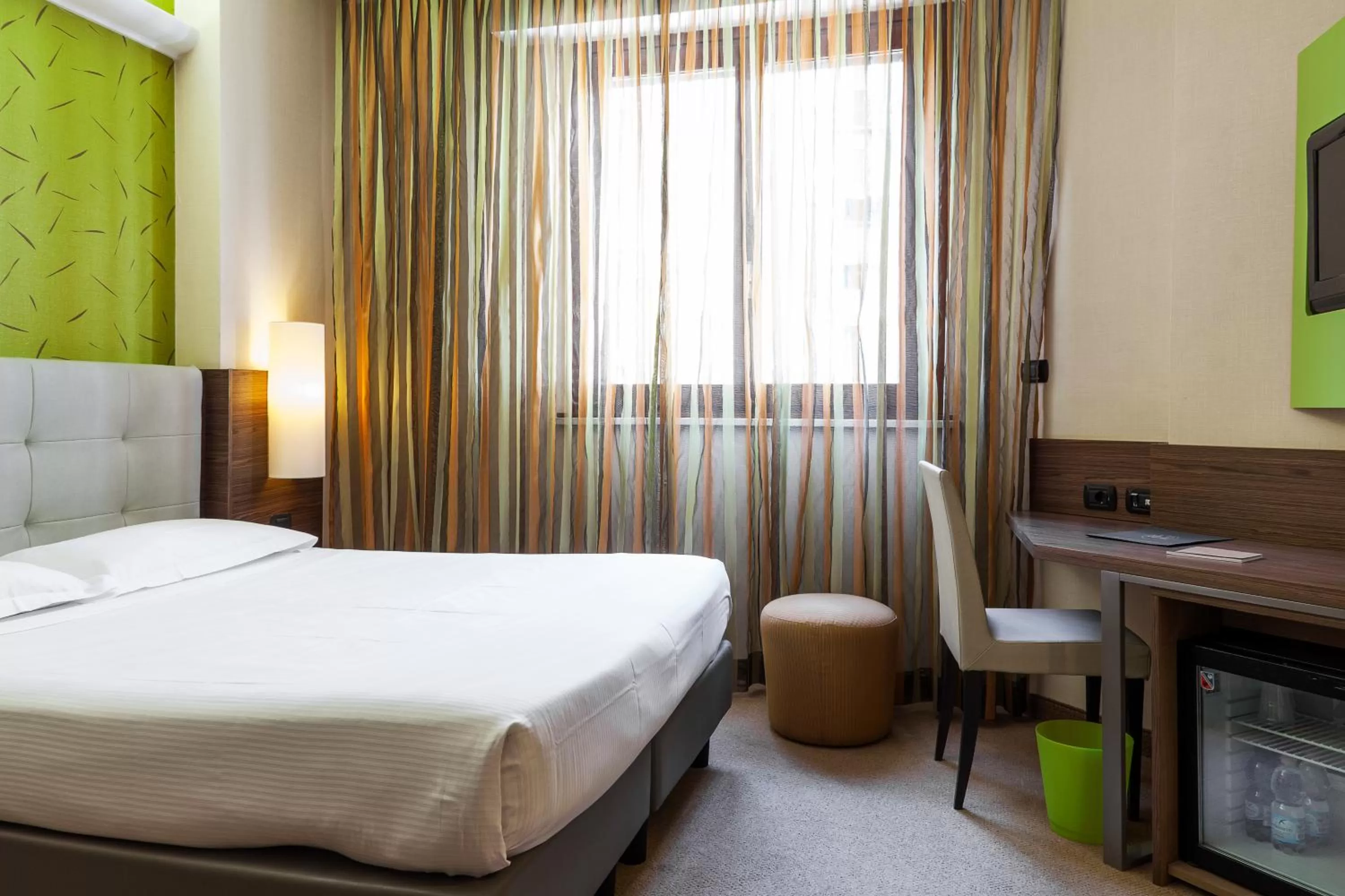 Bed in Hotel Des Etrangers