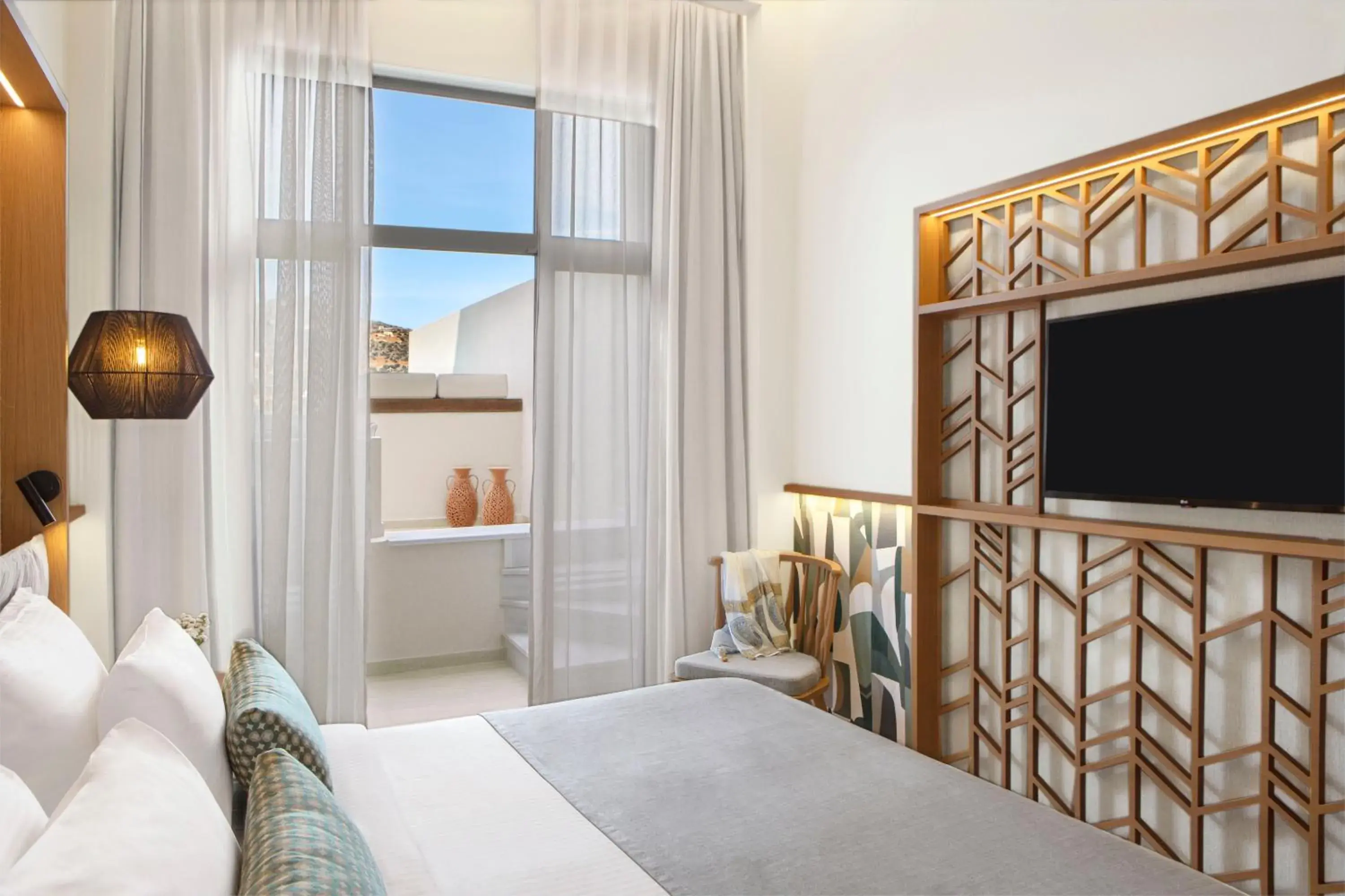 Bedroom, TV/Entertainment Center in Wyndham Grand Crete Mirabello Bay