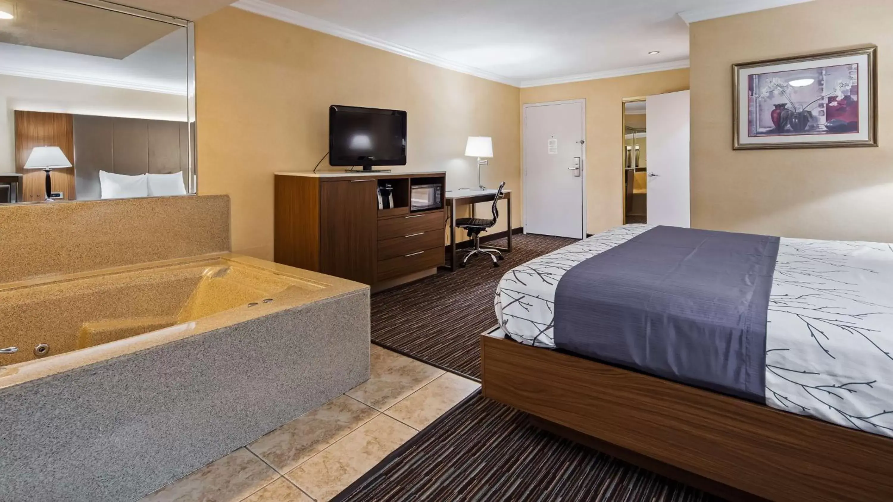 Photo of the whole room, TV/Entertainment Center in Best Western Airpark Hotel - Los Angeles LAX Airport