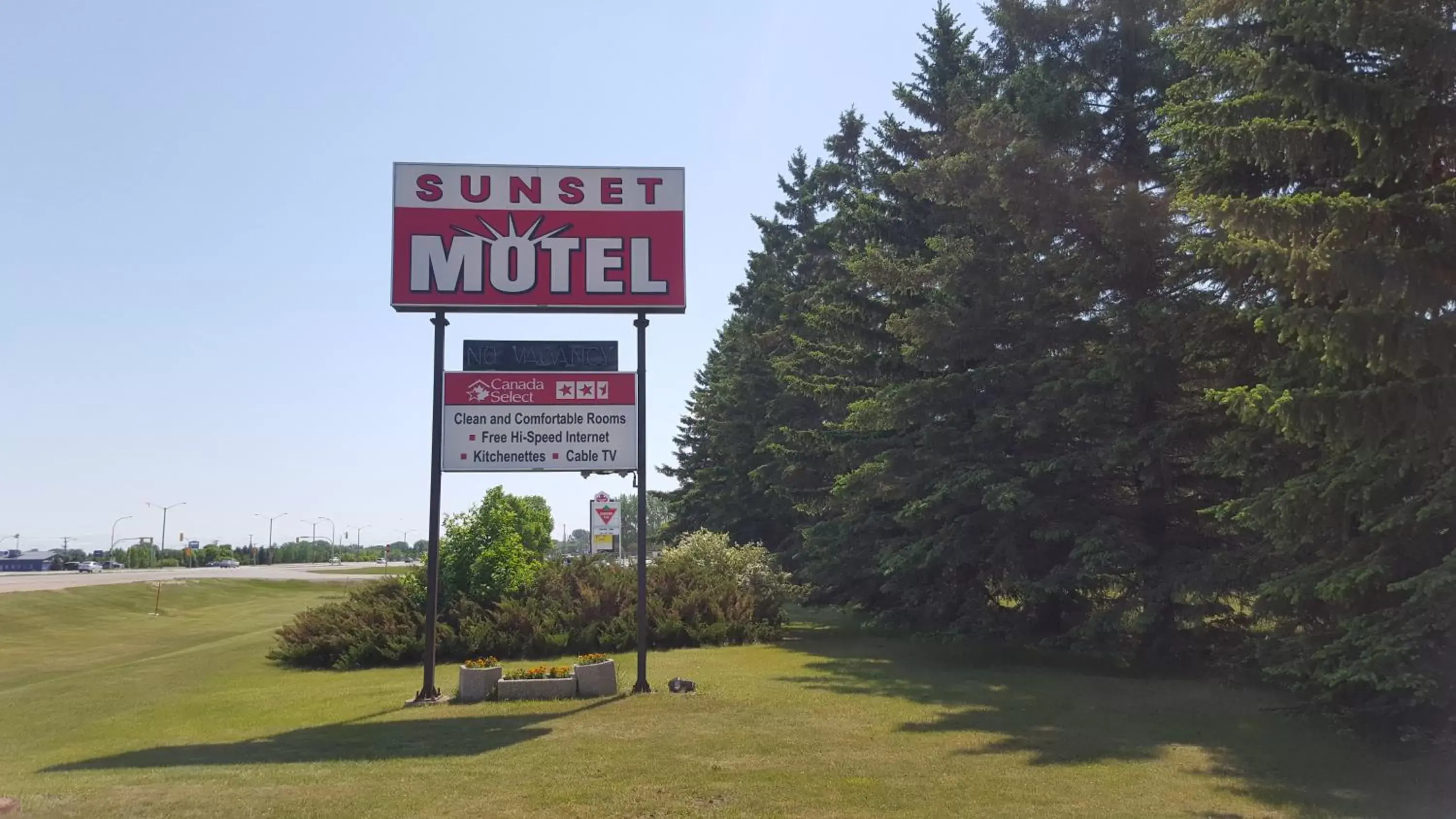 Property logo or sign in Sunset motel