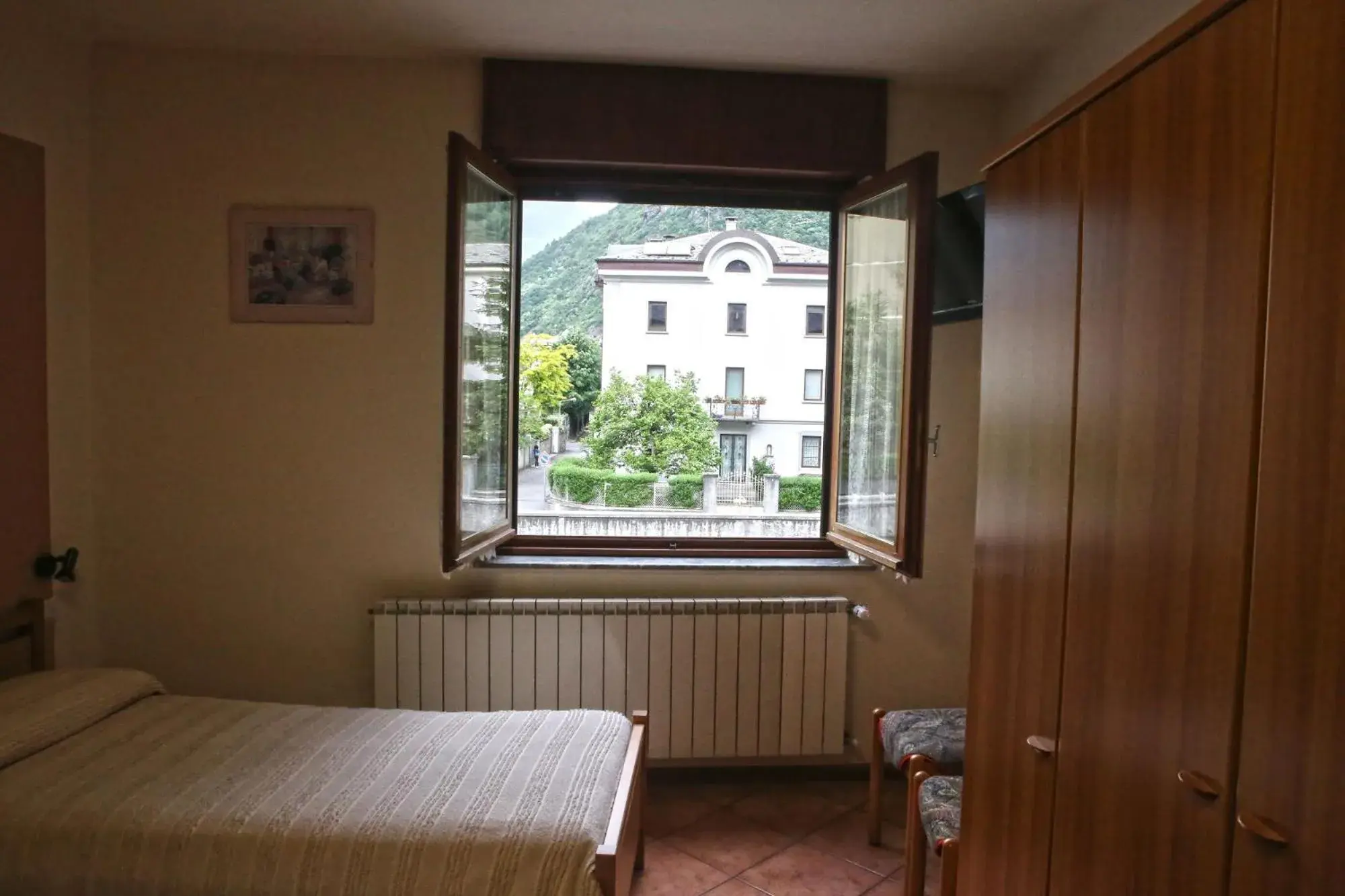 Photo of the whole room, Bed in Albergo Gusmeroli