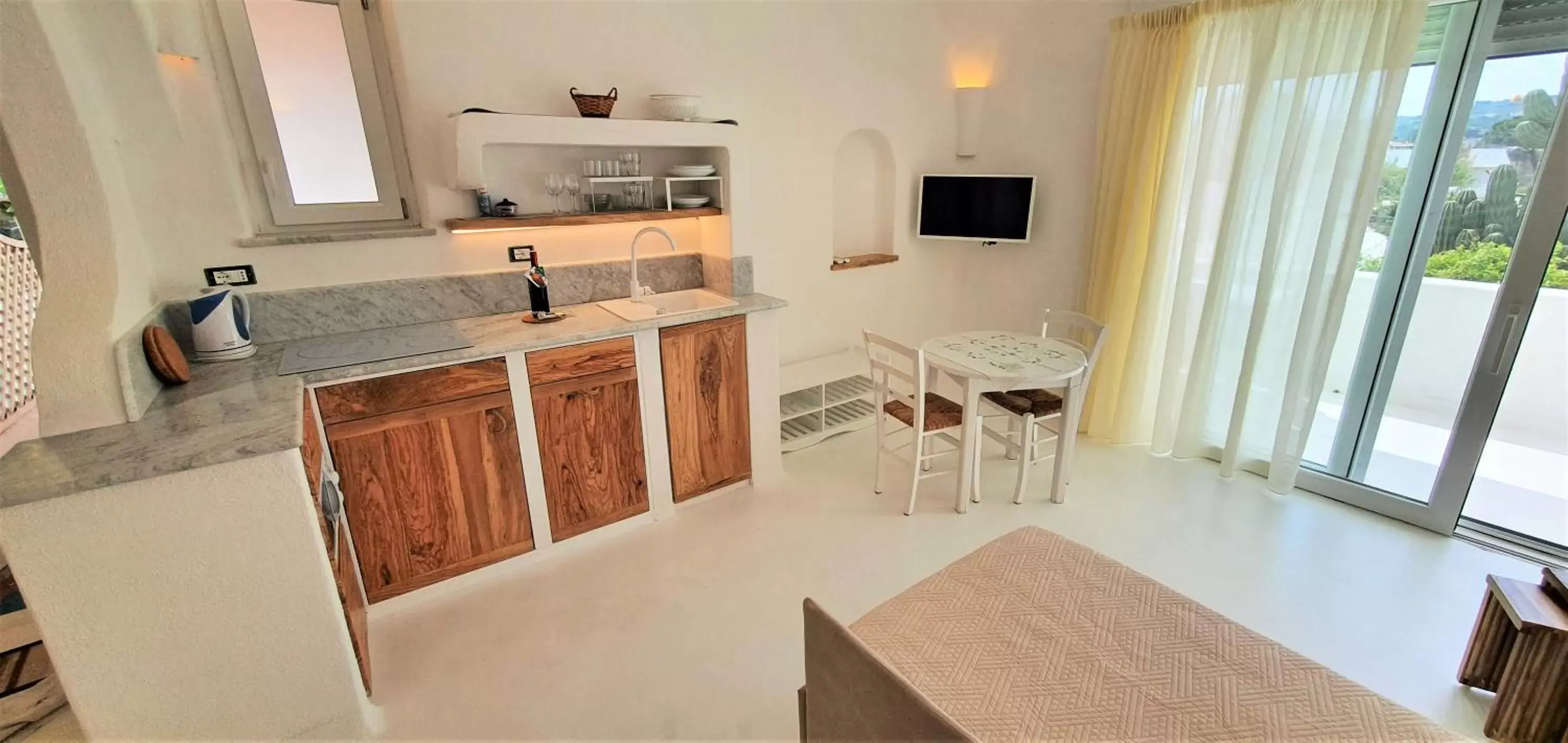 TV and multimedia, Kitchen/Kitchenette in Villa Ravino Aparthotel