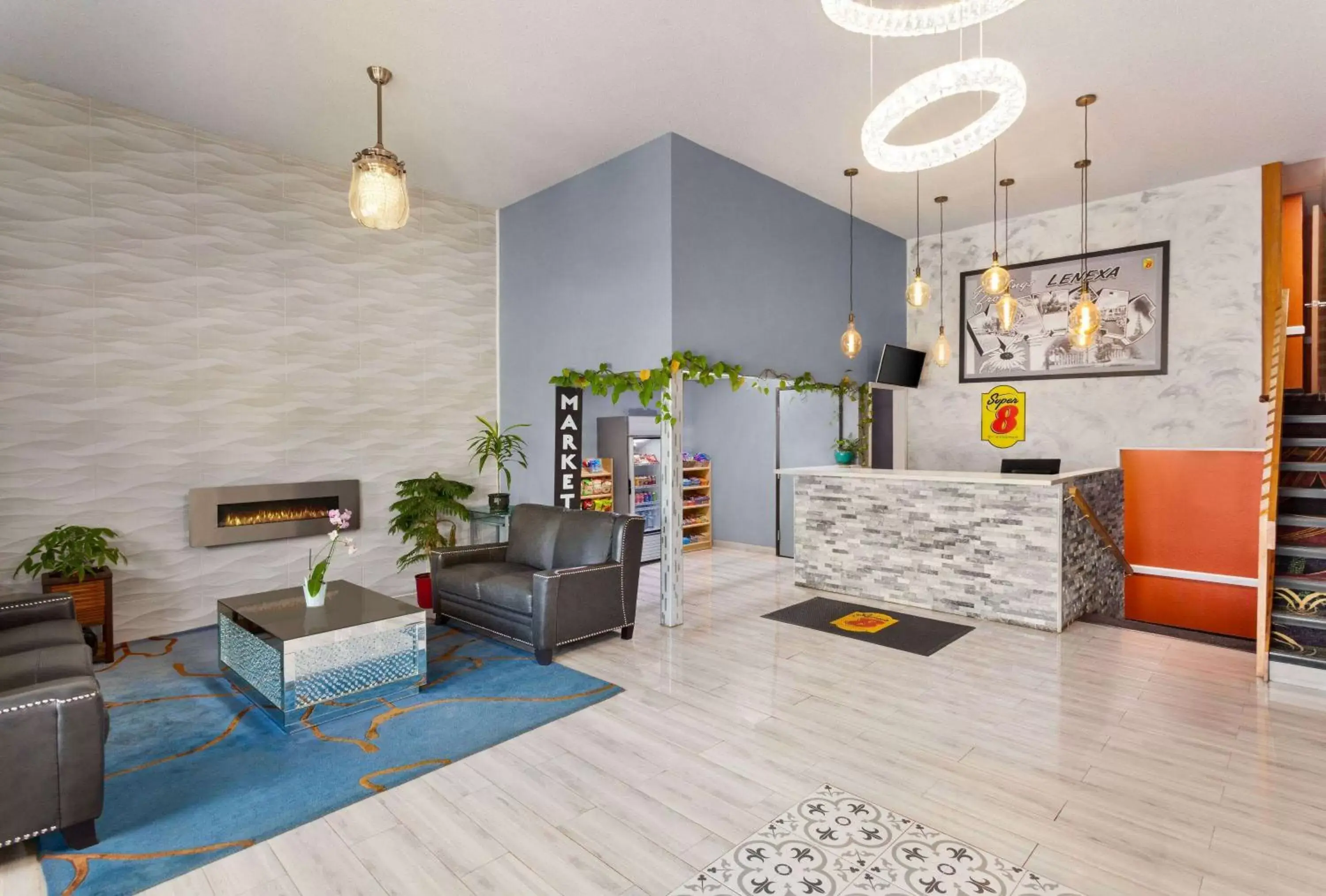 Lobby or reception in Super 8 by Wyndham Lenexa Overland Park Area/Mall Area Lobby or reception in Super 8 by Wyndham Lenexa Overland Park Area/Mall Area