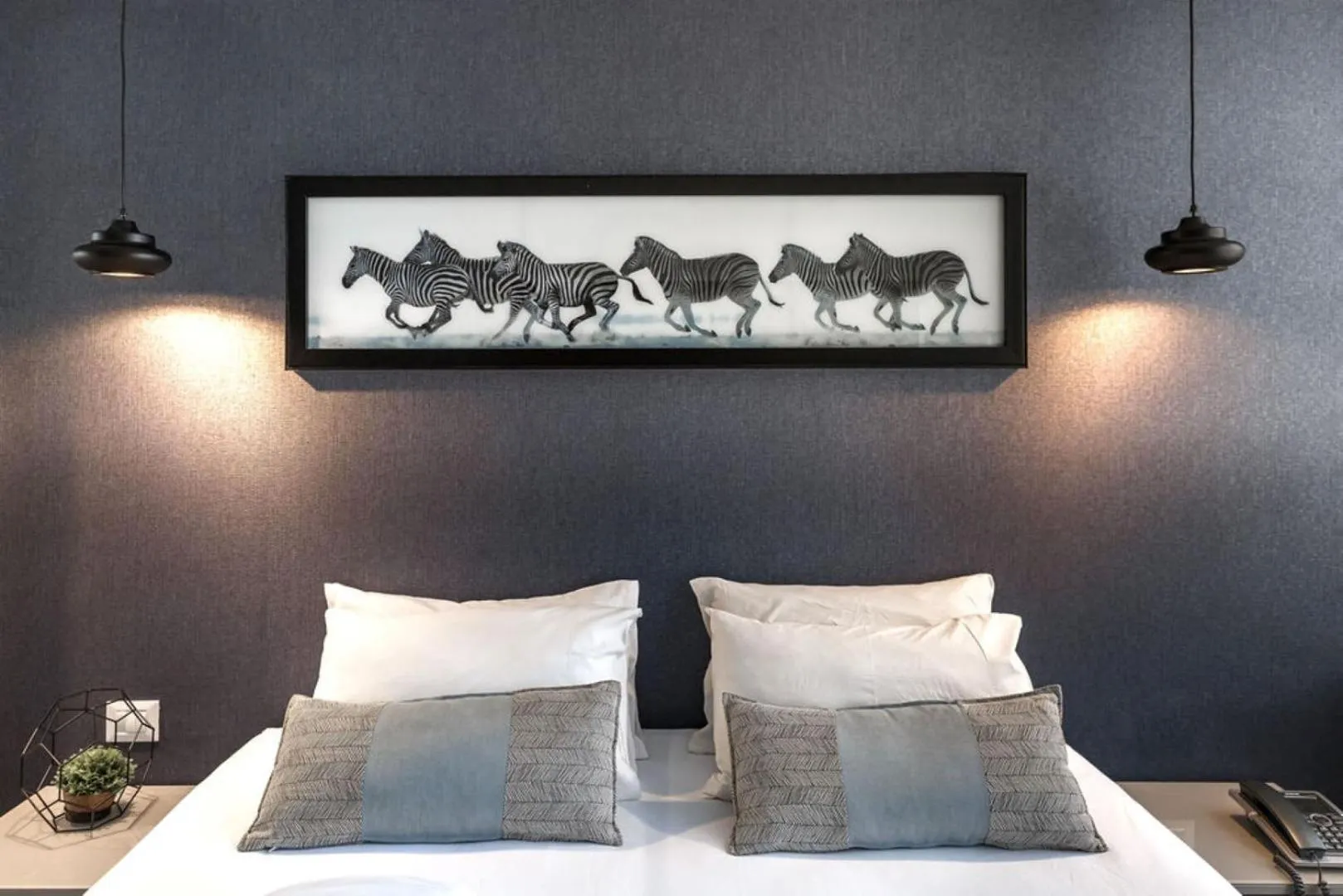 Bed in Kikar Boutique Hotel