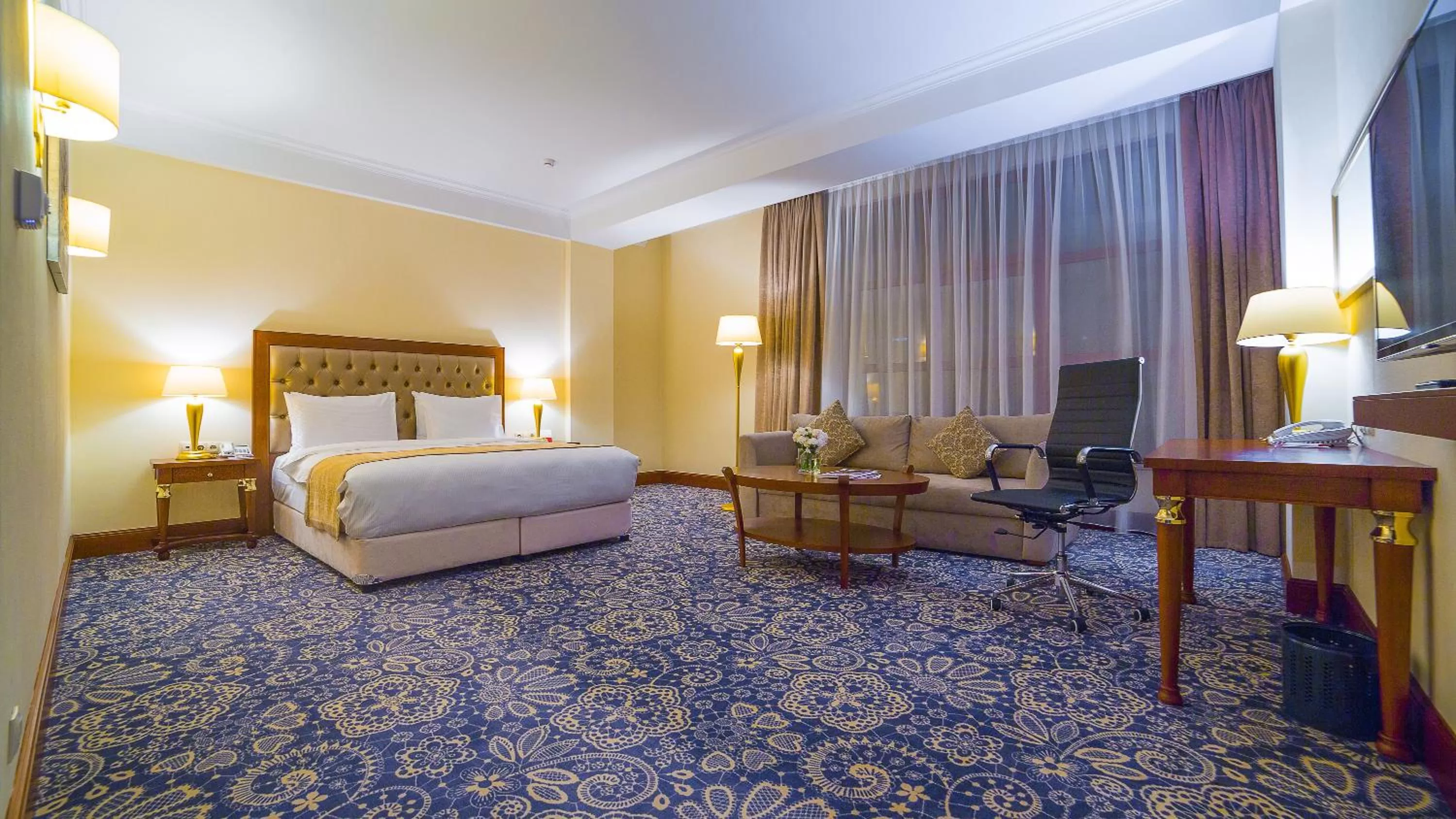 Photo of the whole room, Bed in Ramada by Wyndham Almaty