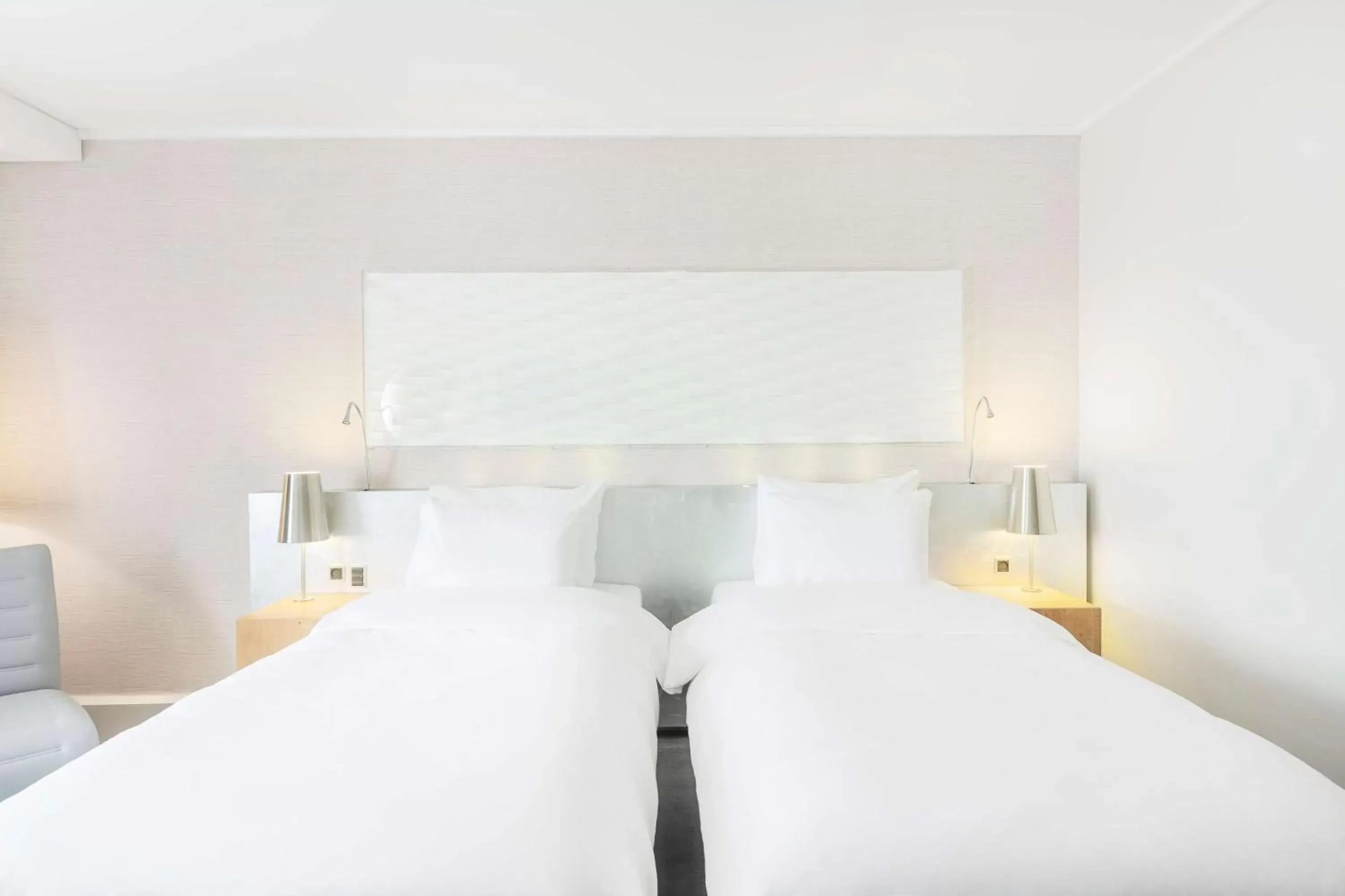 Seating area, Bed in Radisson Blu Scandinavia Hotel Aarhus Seating area, Bed in Radisson Blu Scandinavia Hotel Aarhus