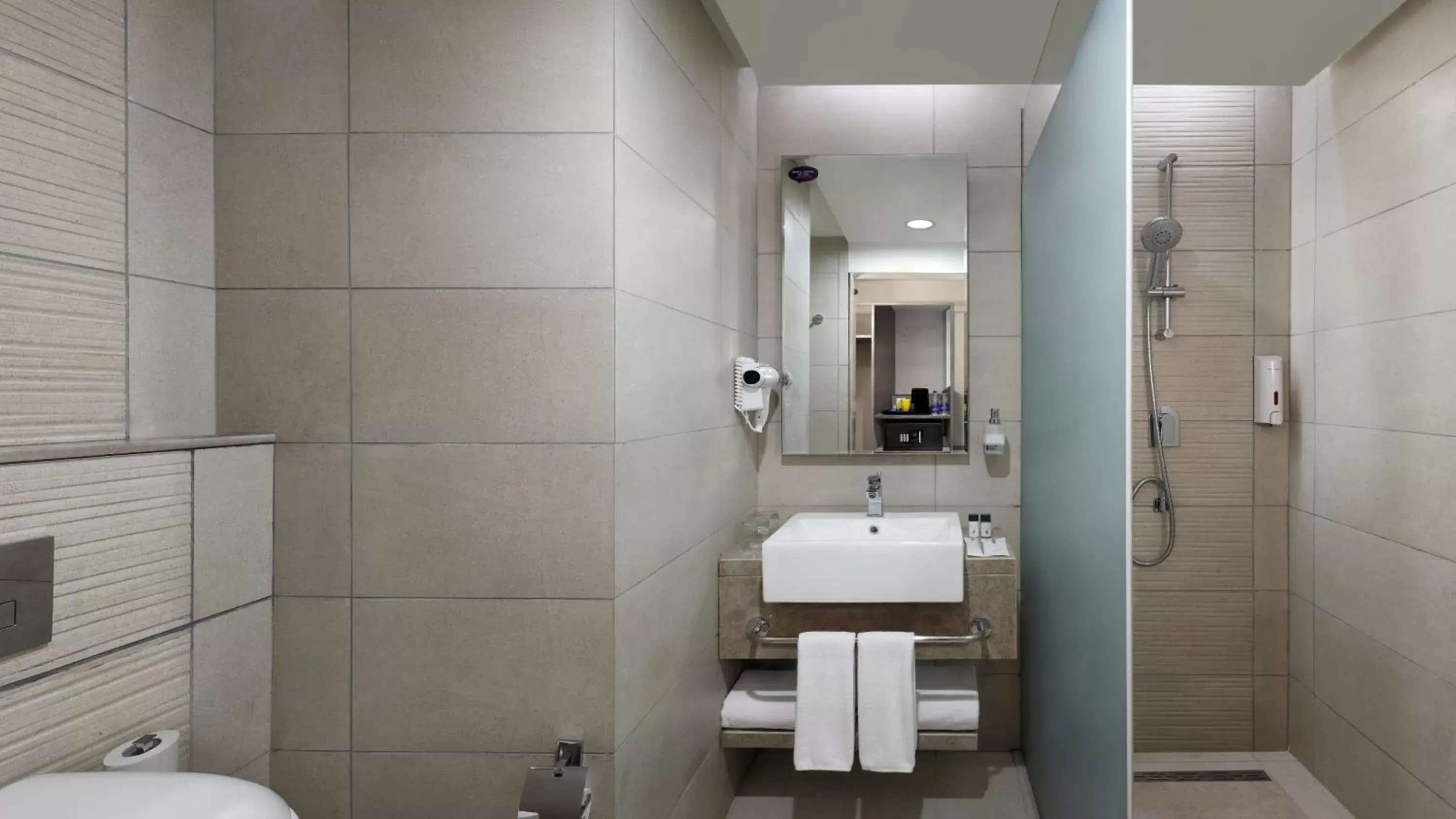 Bathroom in Holiday Inn Express Kolkata Airport, an IHG Hotel