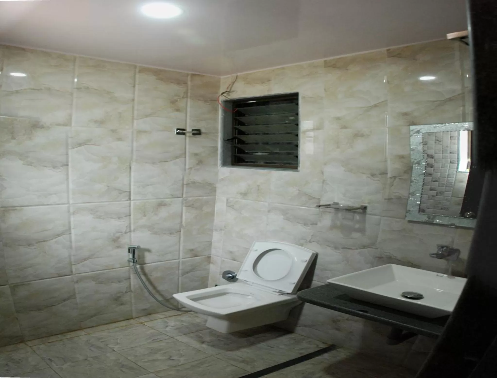 Bathroom in Hotel Sai Bansi