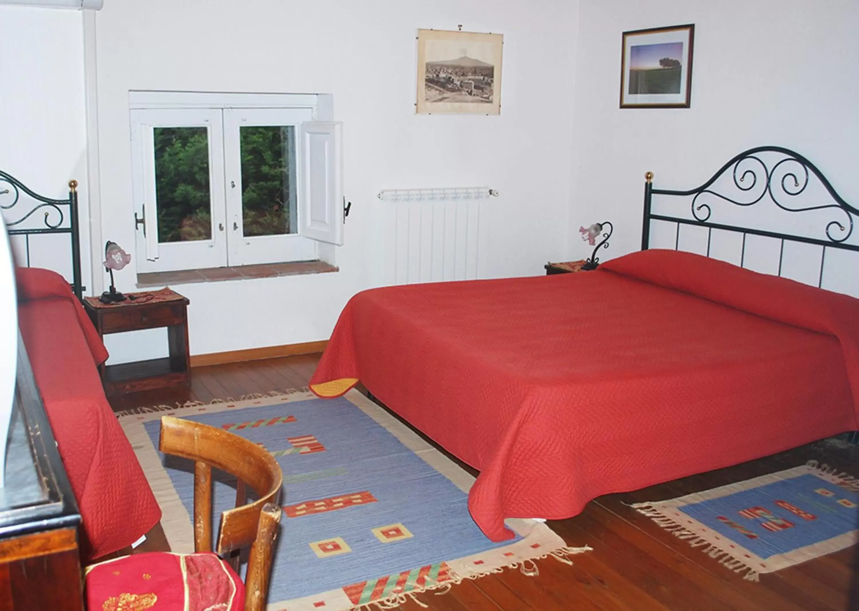 Photo of the whole room, Bed in Case Zuccaro