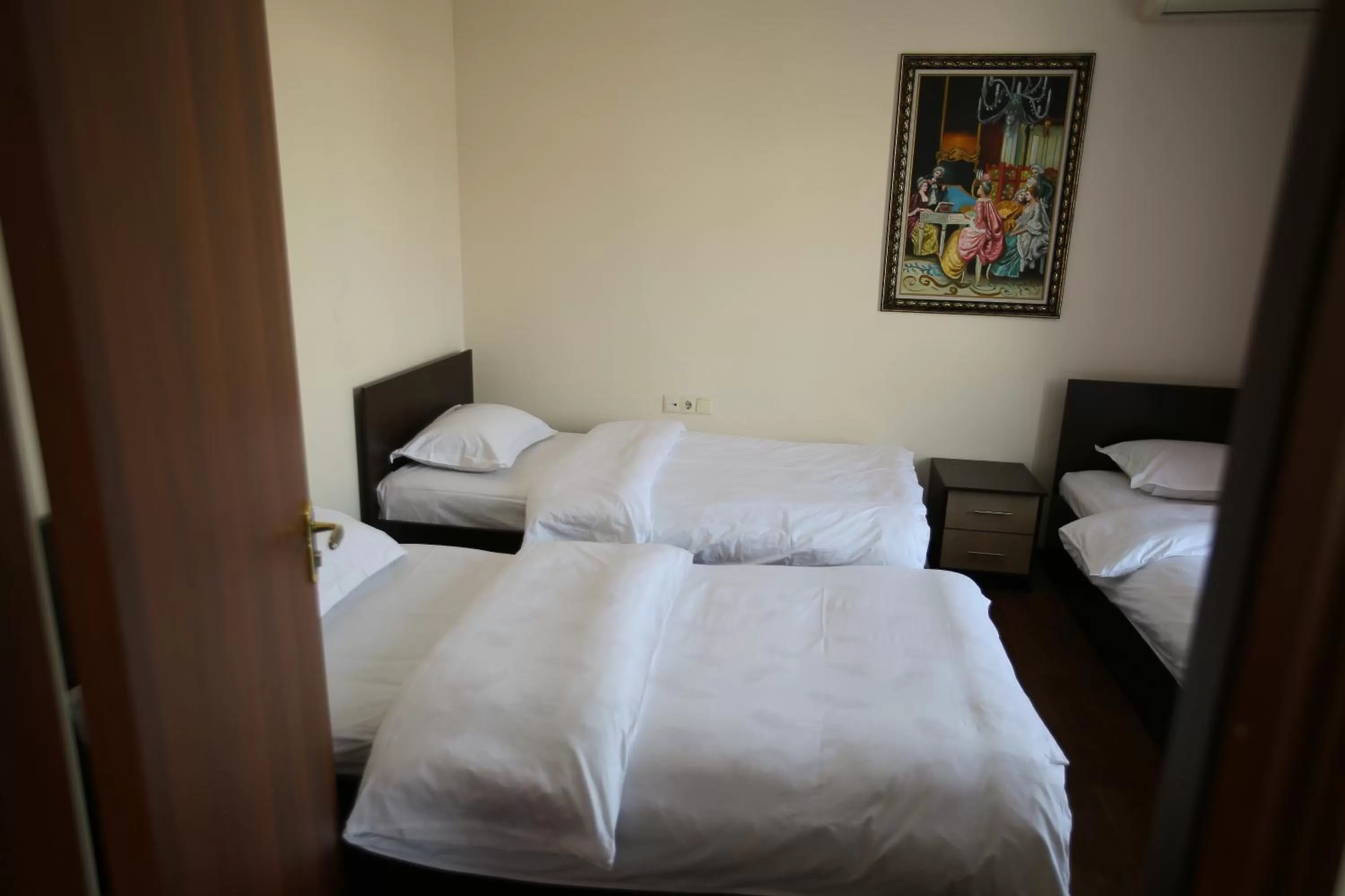 Bed in Altai Business Hotel