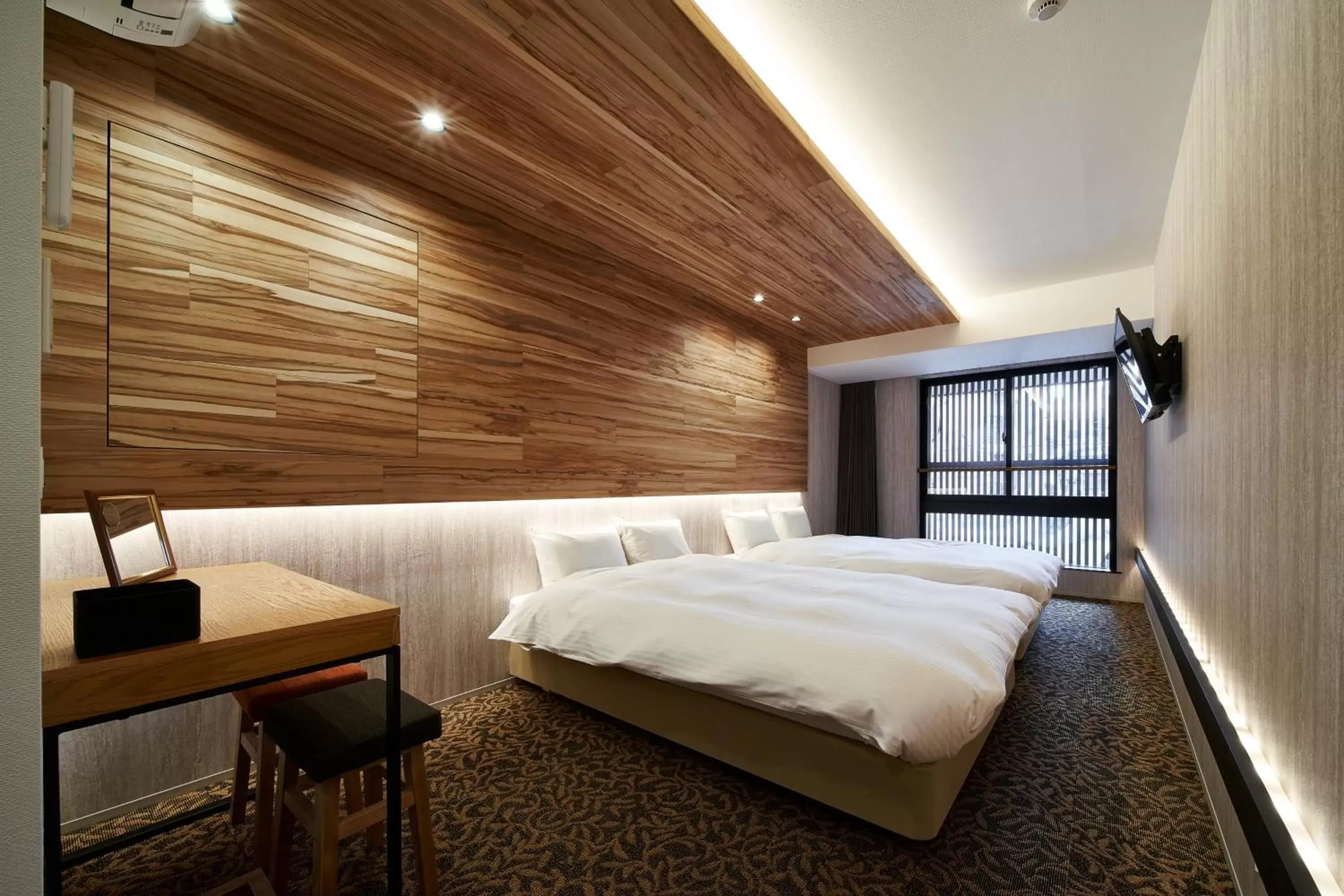 Bed in Carta Hotel Kyoto Bettei